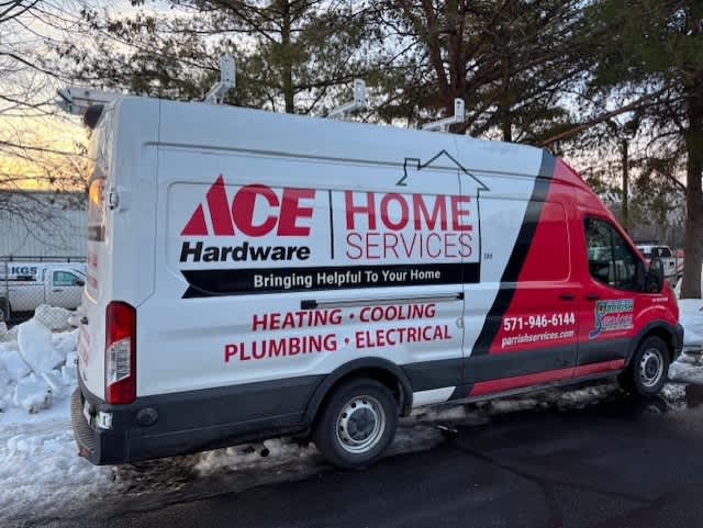 Parrish Services shows trusted, professional home service reliability with clear vehicle branding and easy contact for heating, plumbing, or electrical needs.