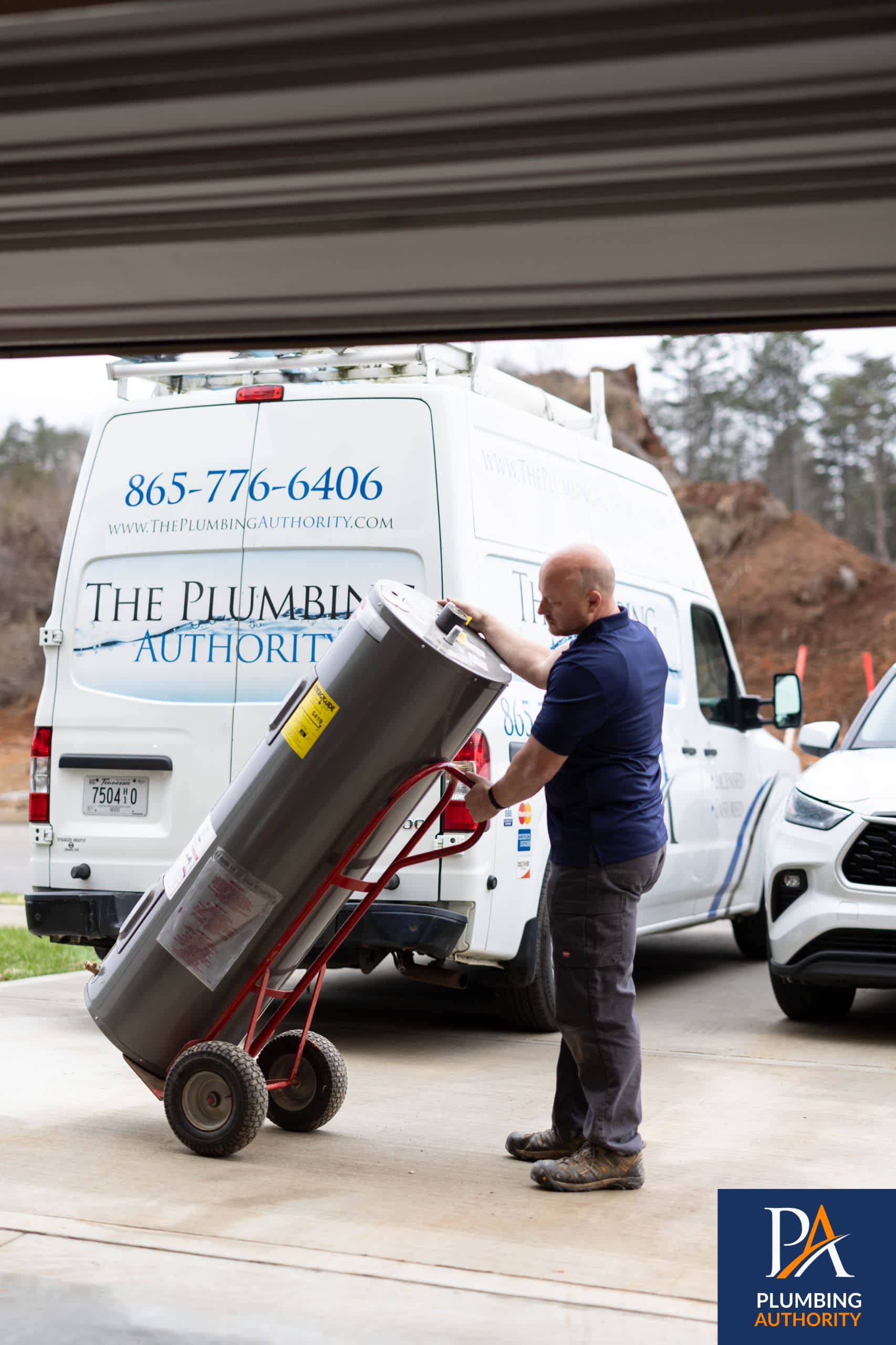Dependable home water heater delivery and installation from The Plumbing Authority, showing skilled technicians and reliable service.