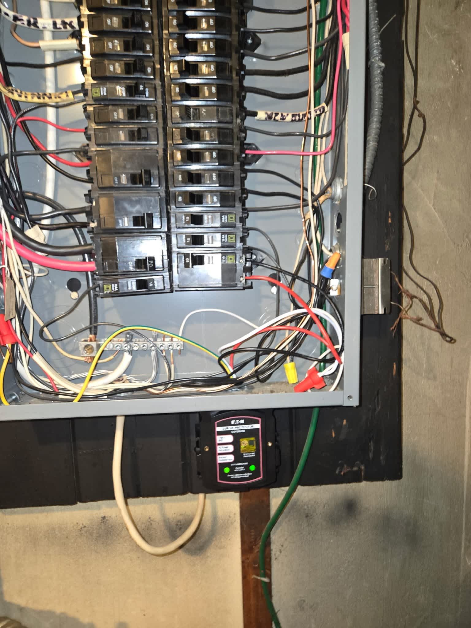 Service Professionals ensure your electrical needs are met with precision and safety, as seen in our detailed panel setups.