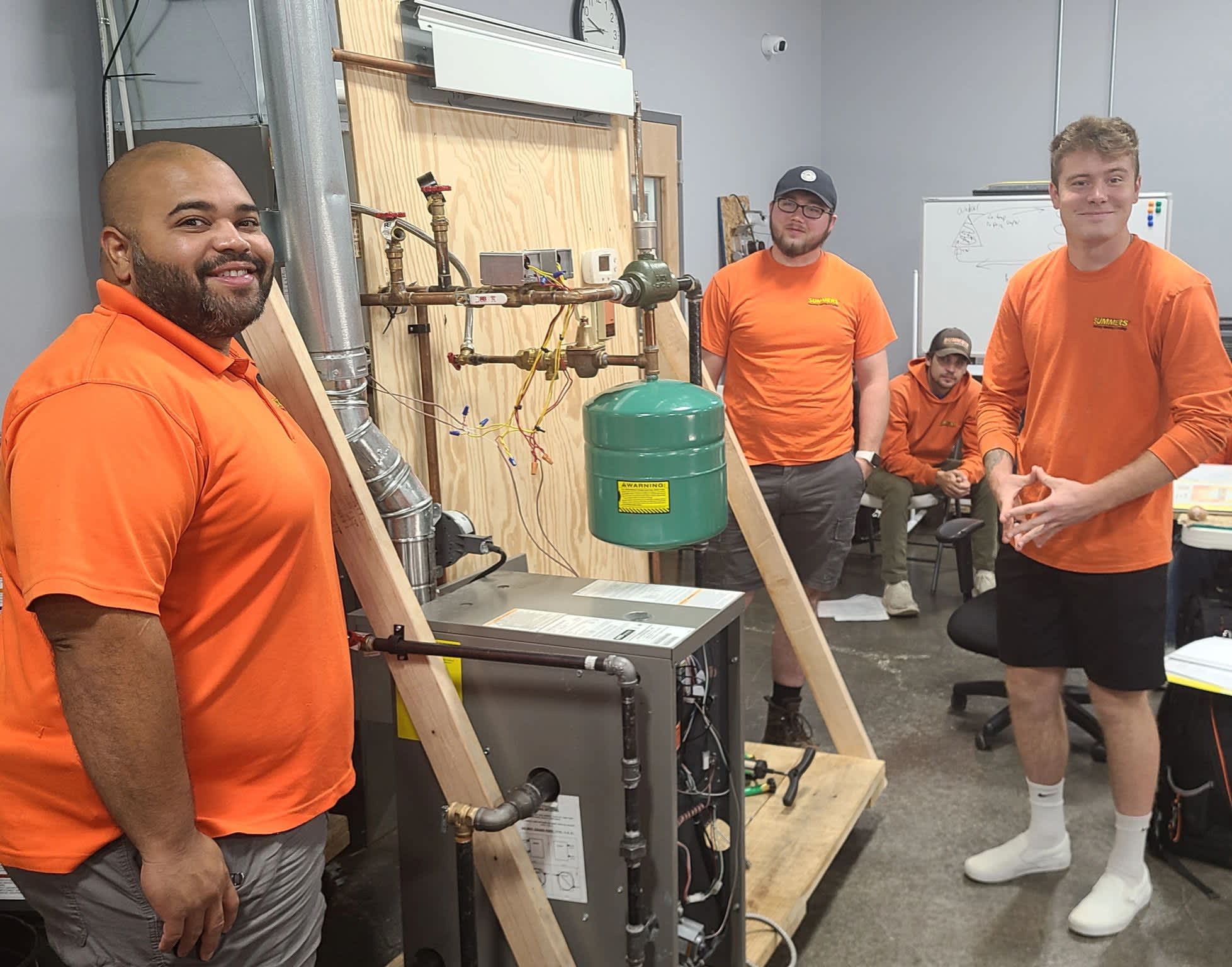 Summers Plumbing Heating & Cooling: Professional HVAC solutions with a dedicated team.