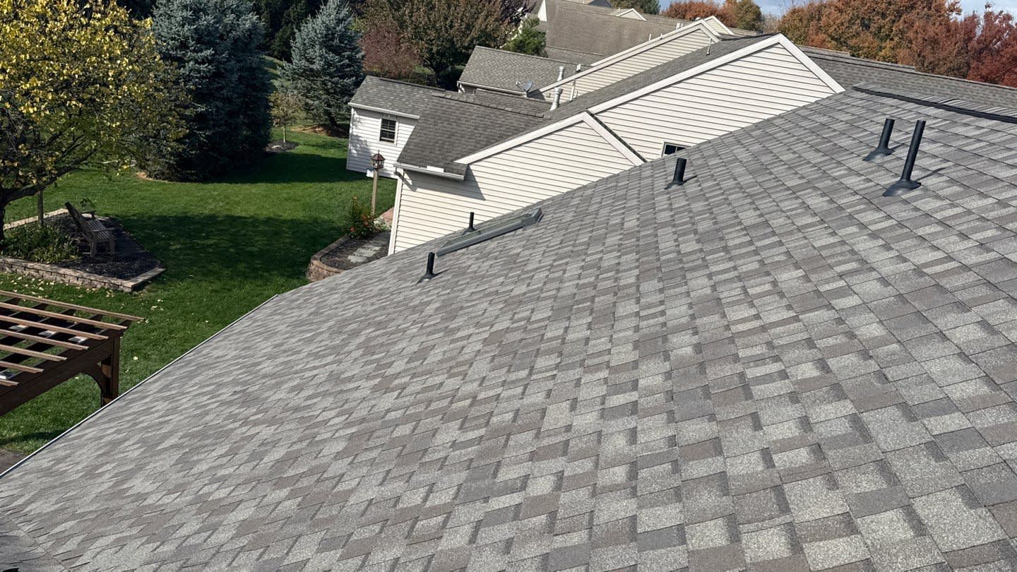 A clean, well-installed shingle roof highlights Mosaic Roofing & Exteriors commitment to durable craftsmanship and attention to detail.