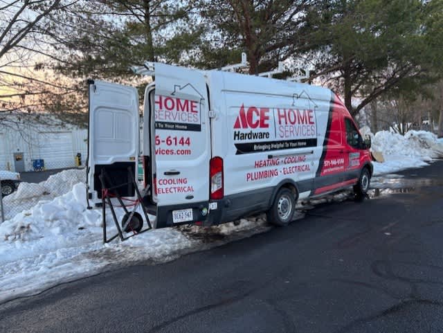 Parrish Services shows up ready for winter service calls, with branded vans and equipment highlighting reliable, professional heating and plumbing support.