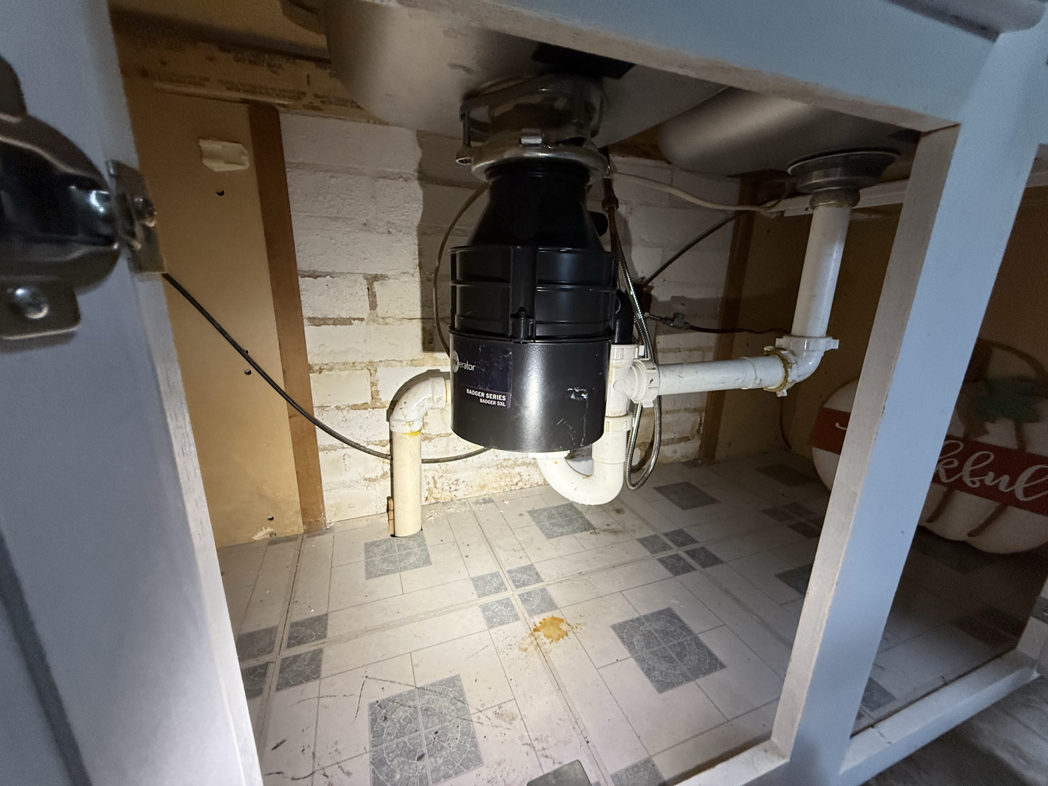 Spot On Plumbing of Tulsa showcases professional garbage disposal installations to keep your kitchen running smoothly.