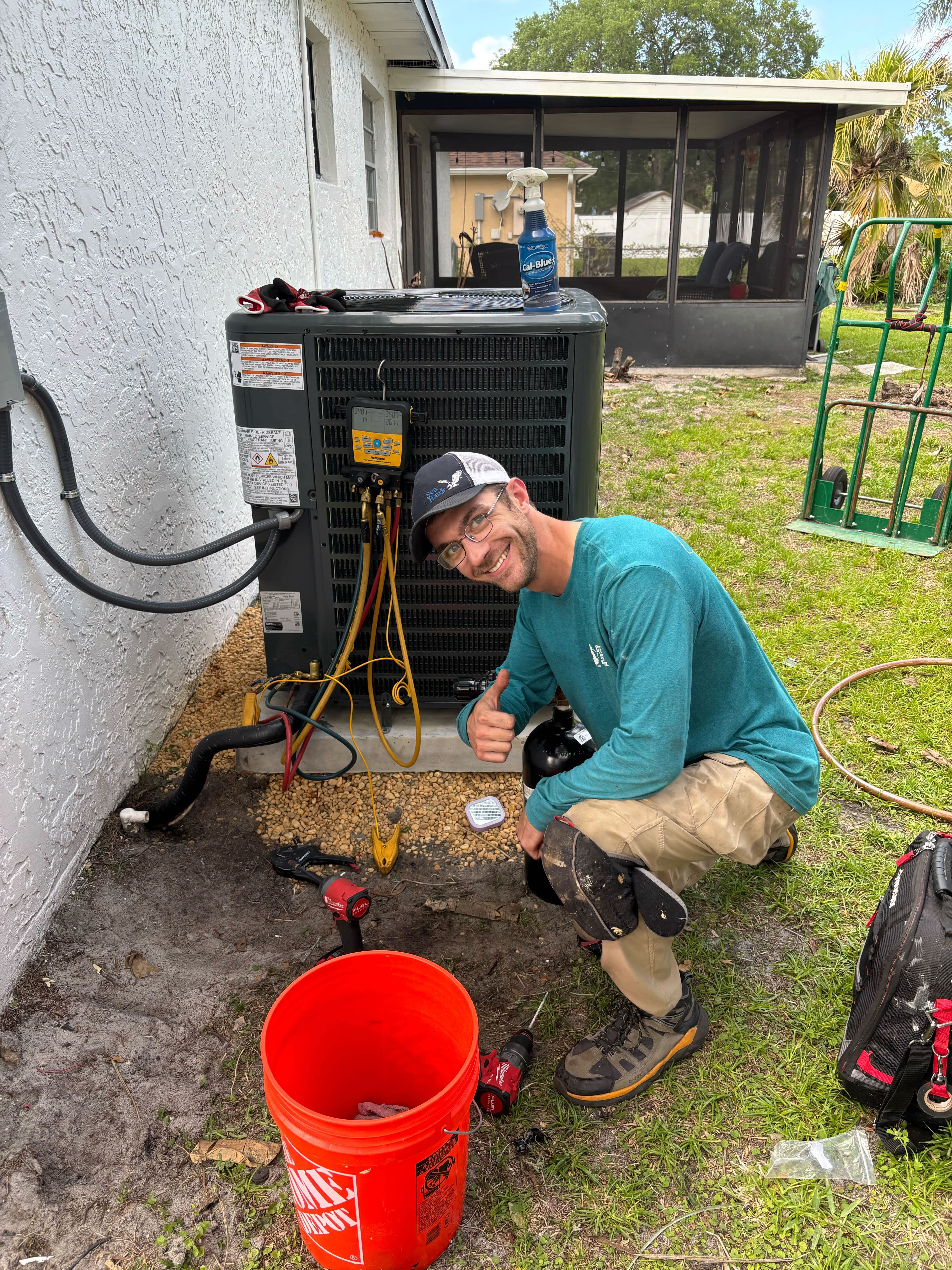 Friendly, professional service on your home cooling system, shown here as Climate Experts Air, Plumbing & Electric ensures reliable maintenance with care.