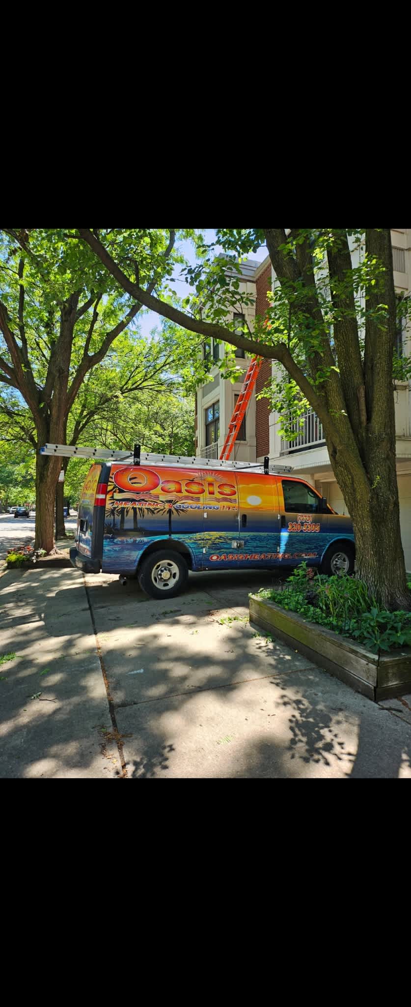 A friendly, professional team from Oasis Heating and Cooling arrives on time to care for your home's comfort with visible attention to detail.