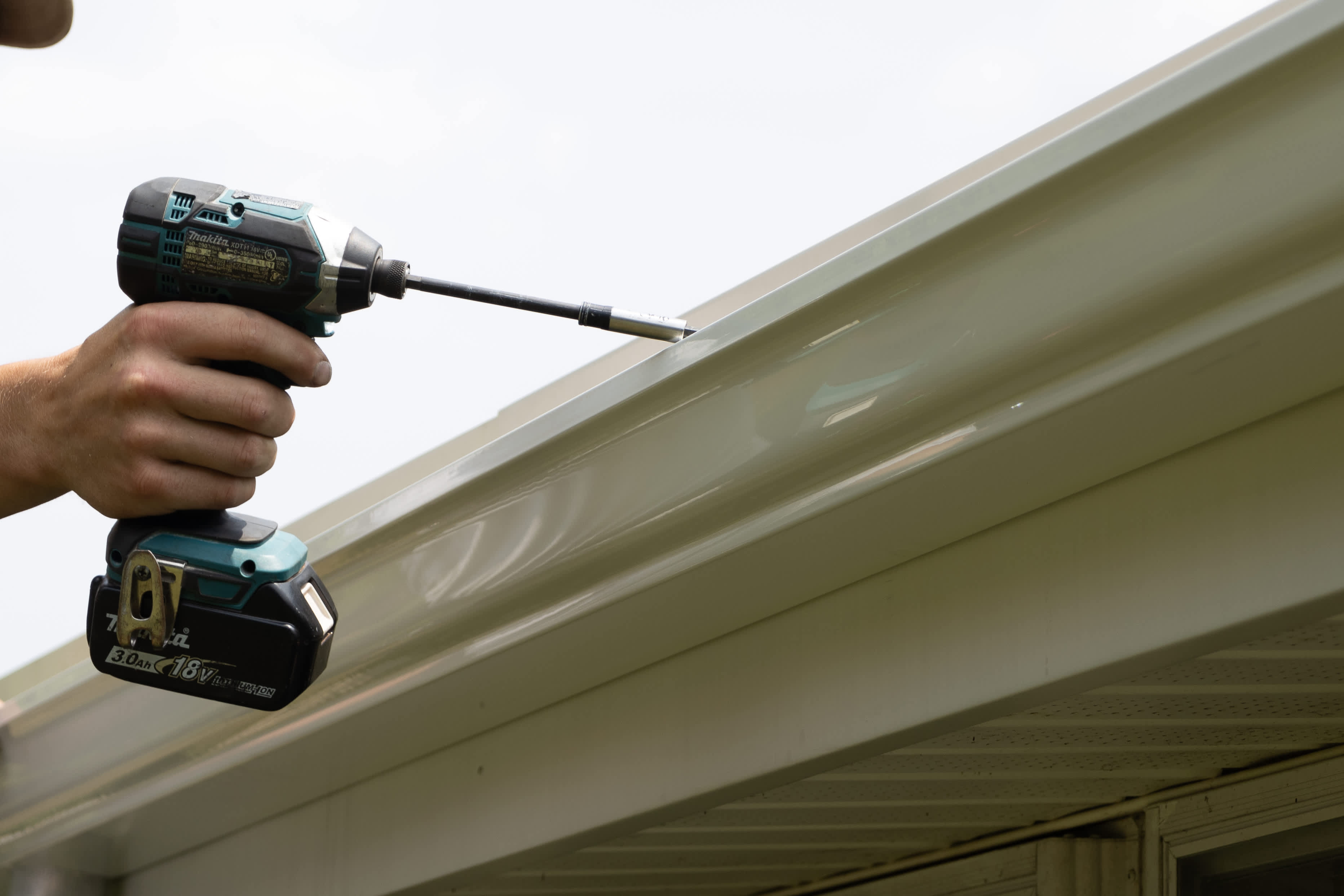 Experience superior craftsmanship with Mast Roofing & Construction's precision gutter services.