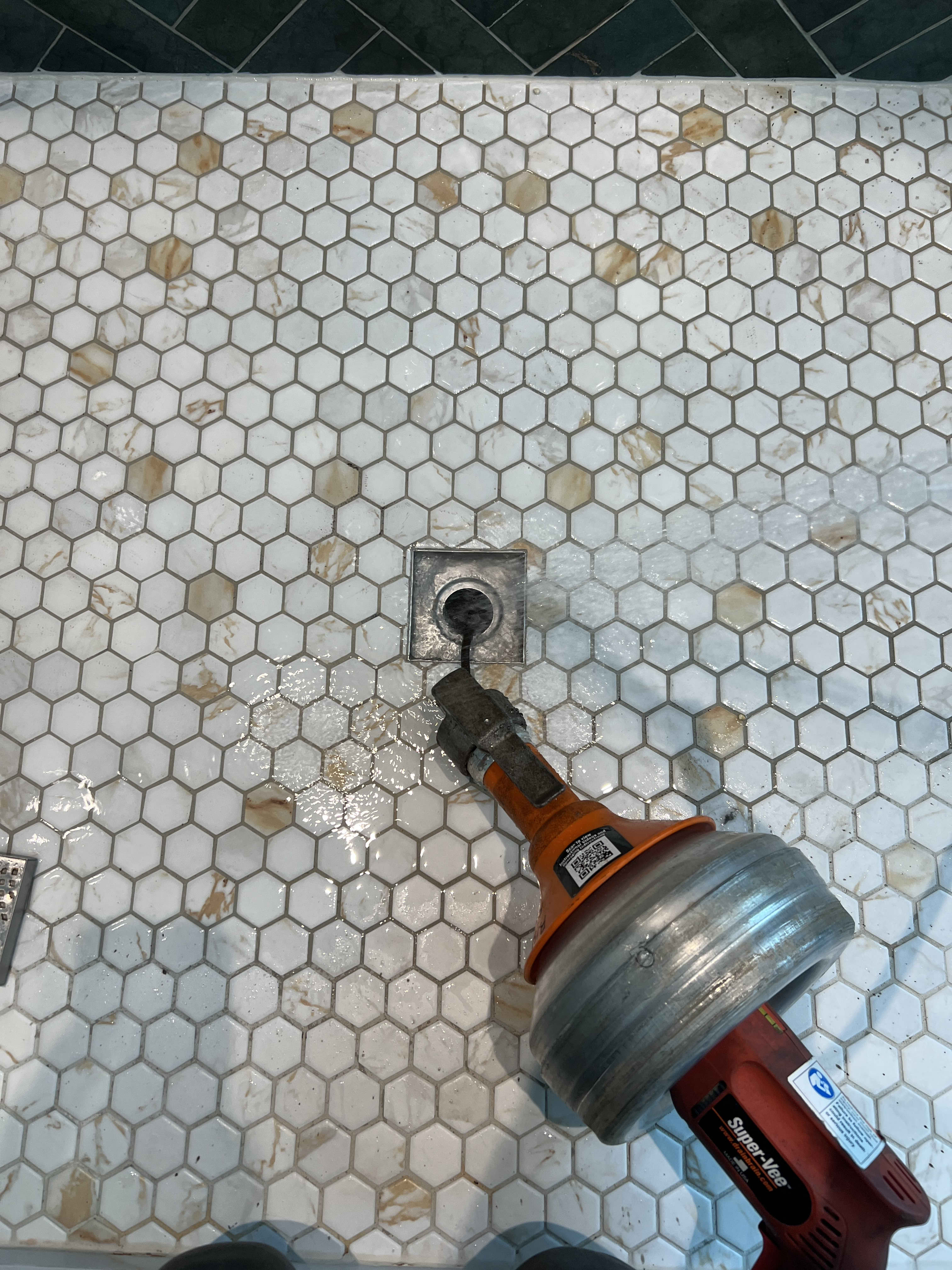 Skilled technicians at Rise Plumbing Systems quickly and carefully clear shower drains, protecting tile surfaces while restoring proper flow.