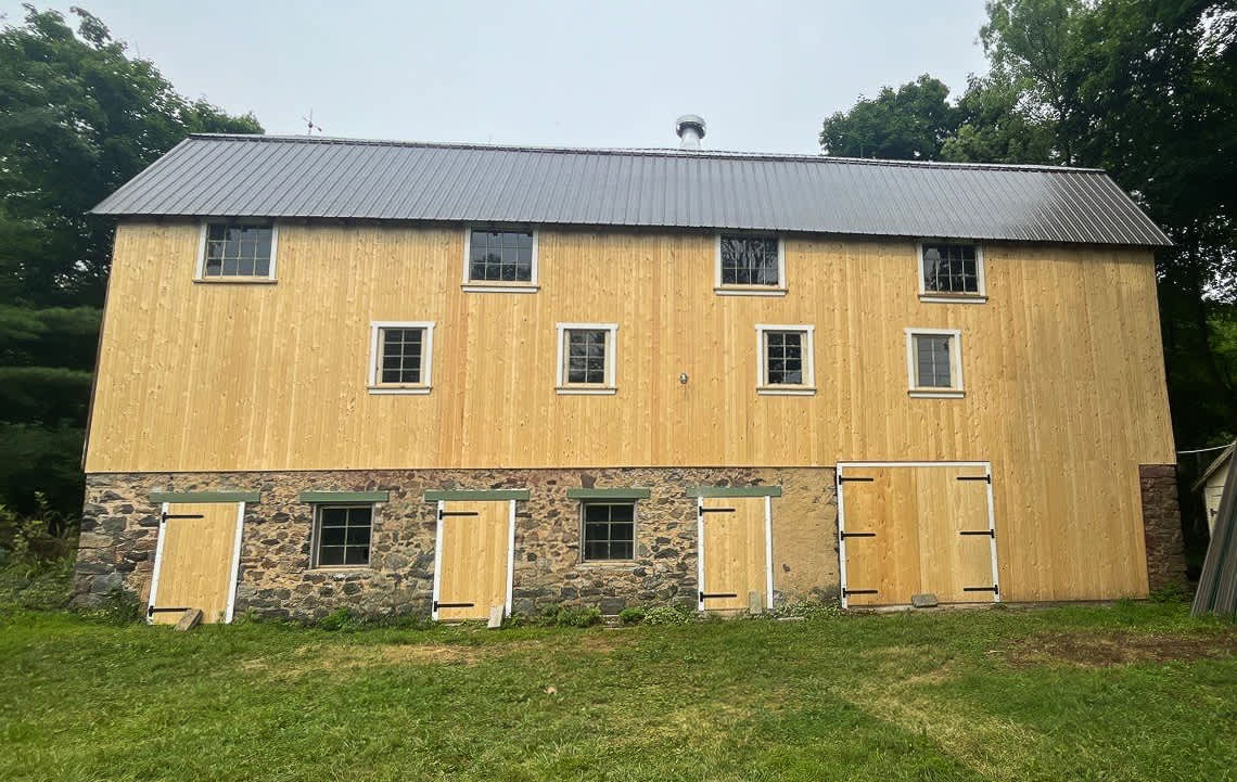 Showcasing quality craftsmanship and professional roofing solutions, Mast Roofing & Construction transforms your structures with precision and care.