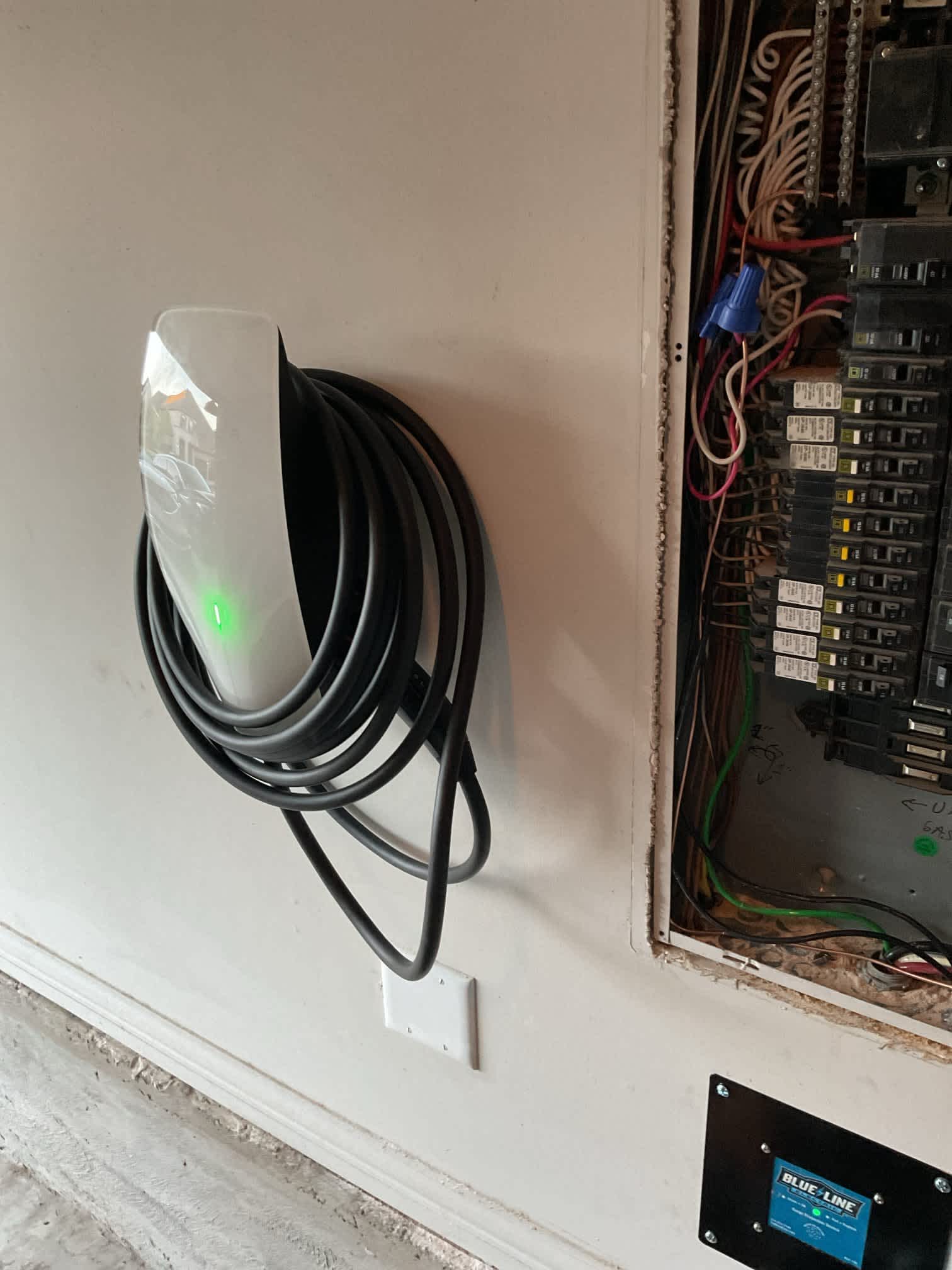 Empower your home with Blue Line Electric's reliable EV Charger Installation, ensuring quality and professionalism in every detail.