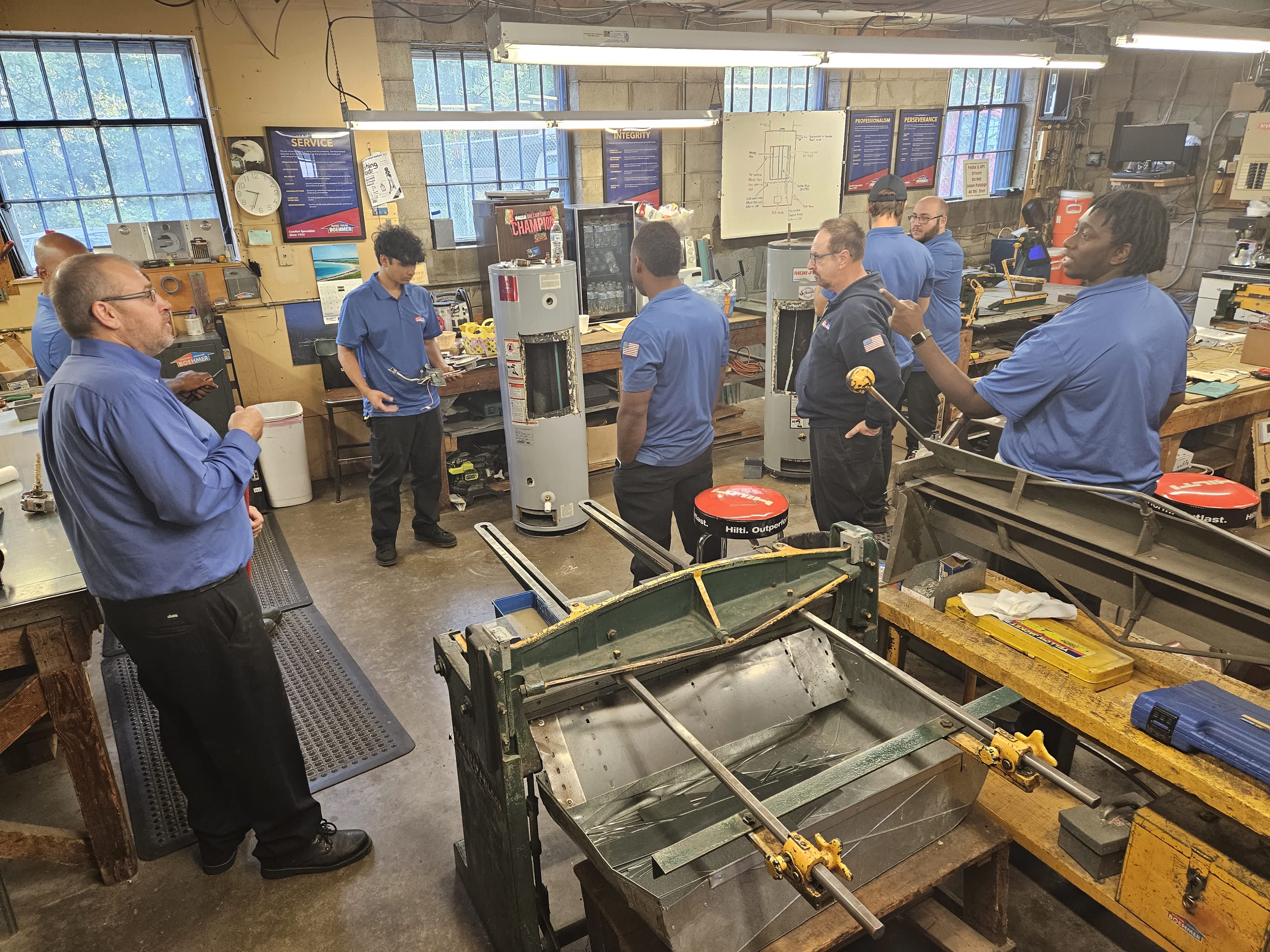 At Boehmer Heating & Cooling, our team excels in providing top-notch HVAC services with professionalism and teamwork at our core.