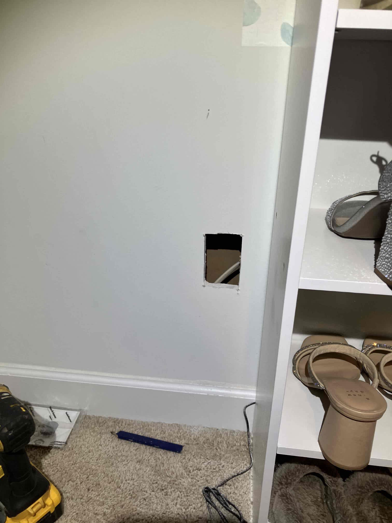 Inside a lived-in home, Dawson's Electric & Air neatly accessed wiring to complete the job with care and respect for the space.