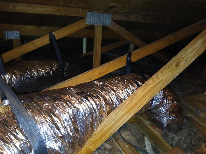 Experience top-tier energy efficiency and secure installations with ECM Air Conditioning's expertly insulated ductwork.