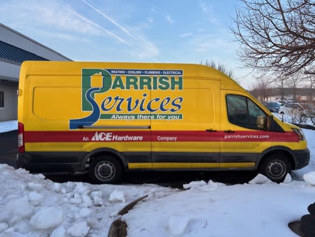 Trust Parrish Services for dependable, professional home comfort solutions, shown here in their easily recognizable branded service van.
