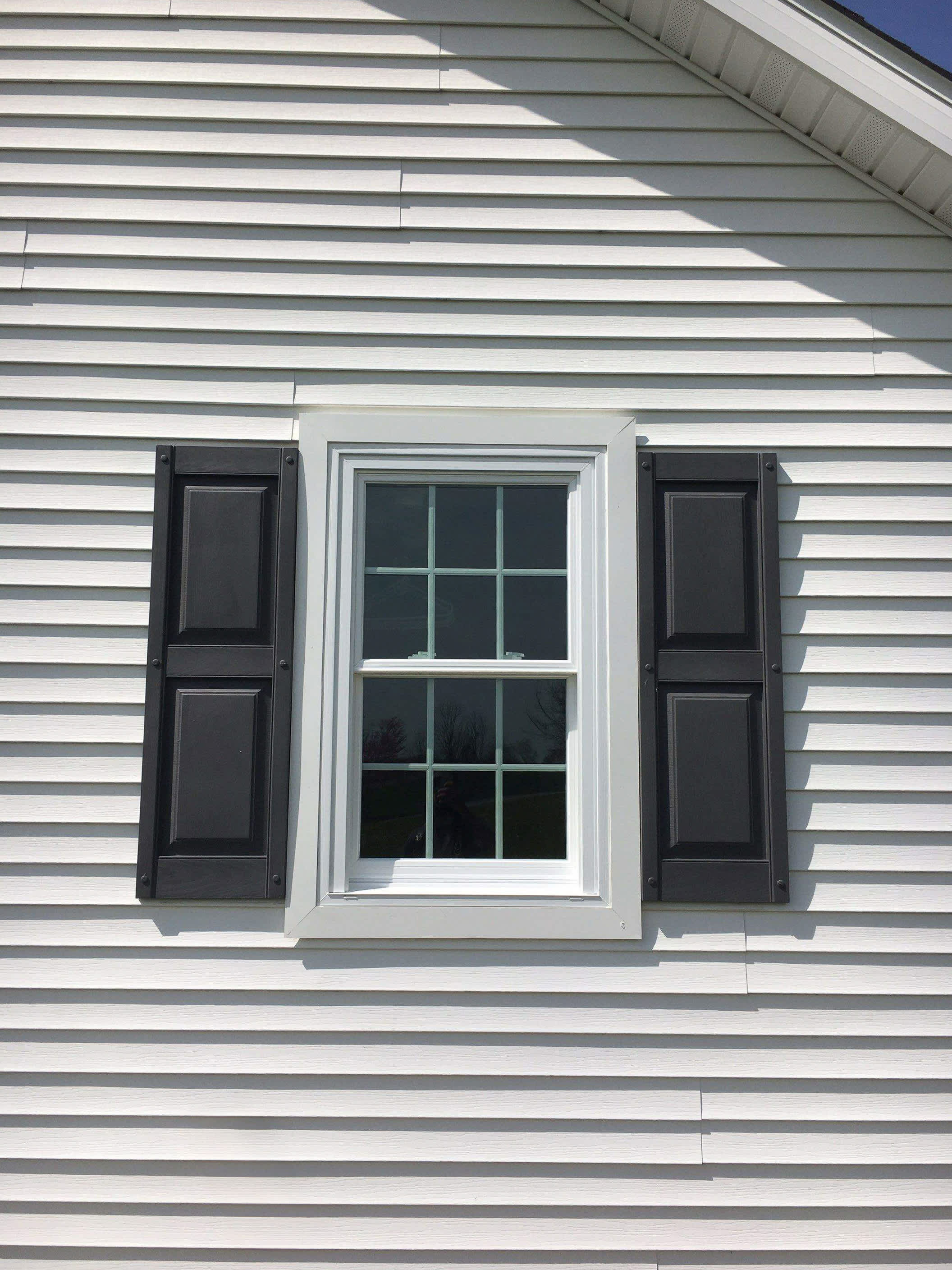 Enhance your home's curb appeal with Mast Roofing & Construction's premium siding and window solutions.