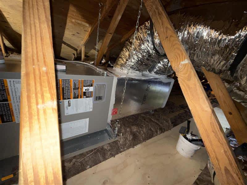 ECM Air Conditioning provides expertly installed HVAC solutions to keep your home comfortable and efficient, even in the tightest attic spaces.