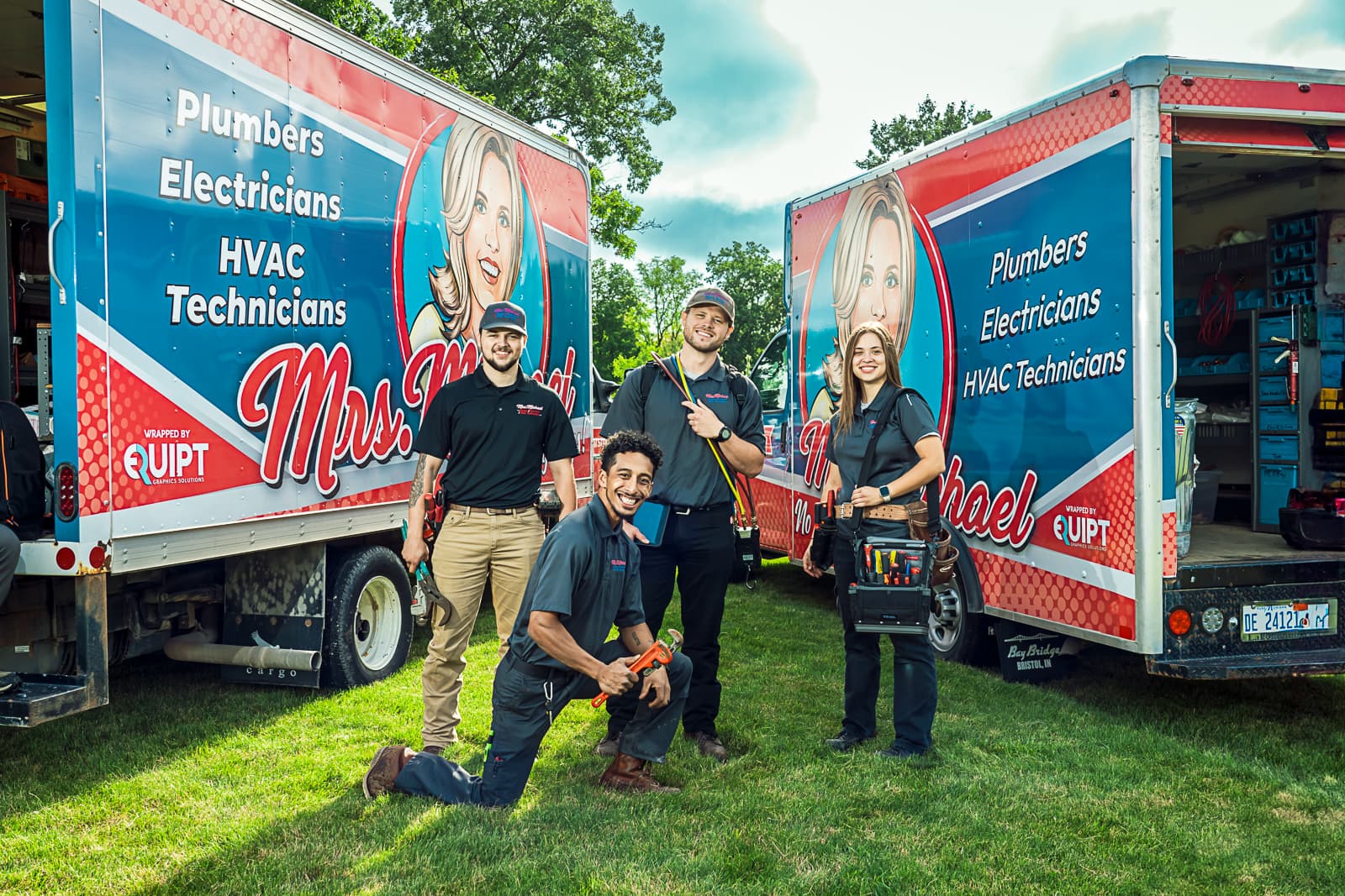 Mrs. Michael Plumbers, Electricians, and HVAC Technicians showcase their dedicated team, ready to provide quality service with a smile.