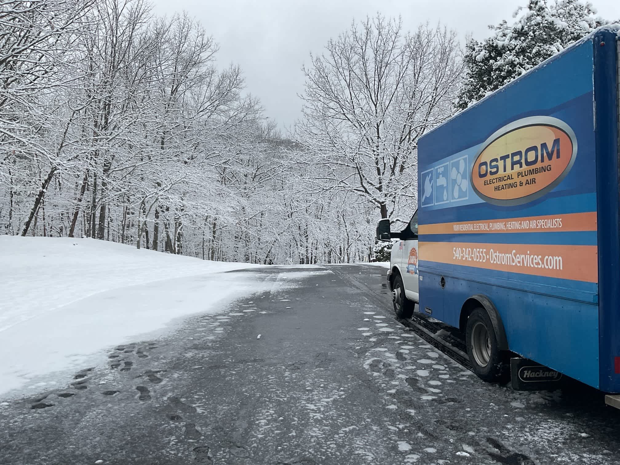 Ostrom Electrical Plumbing Heating & Air is ready to serve you in any weather, ensuring warmth and comfort even in the snow.