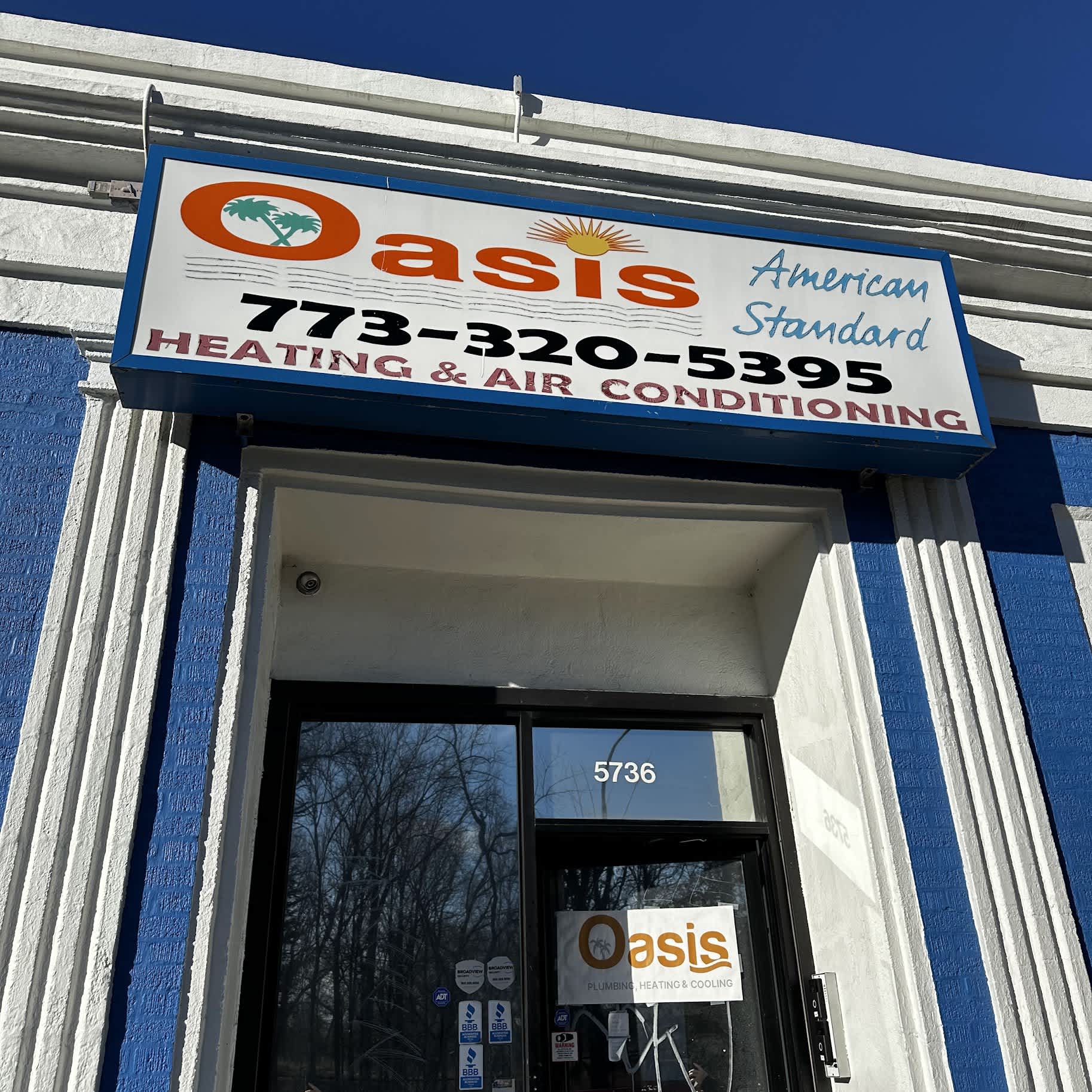 Clean, professional storefront signage shows Oasis Heating and Cooling’s commitment to trust and reliable HVAC service.