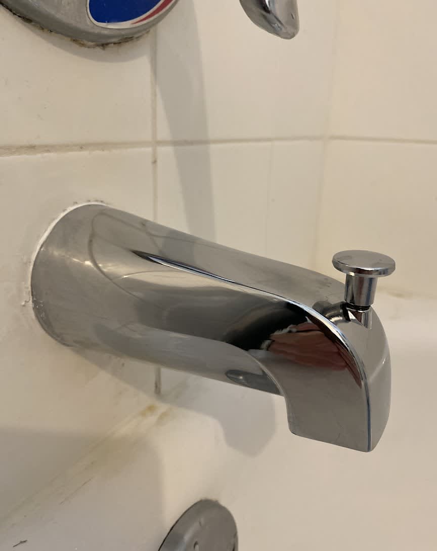 Reliable workmanship on bathtub fixtures shines through, showcasing how Abacus Plumbing, Air Conditioning, & Electrical restores tidy, functional baths.