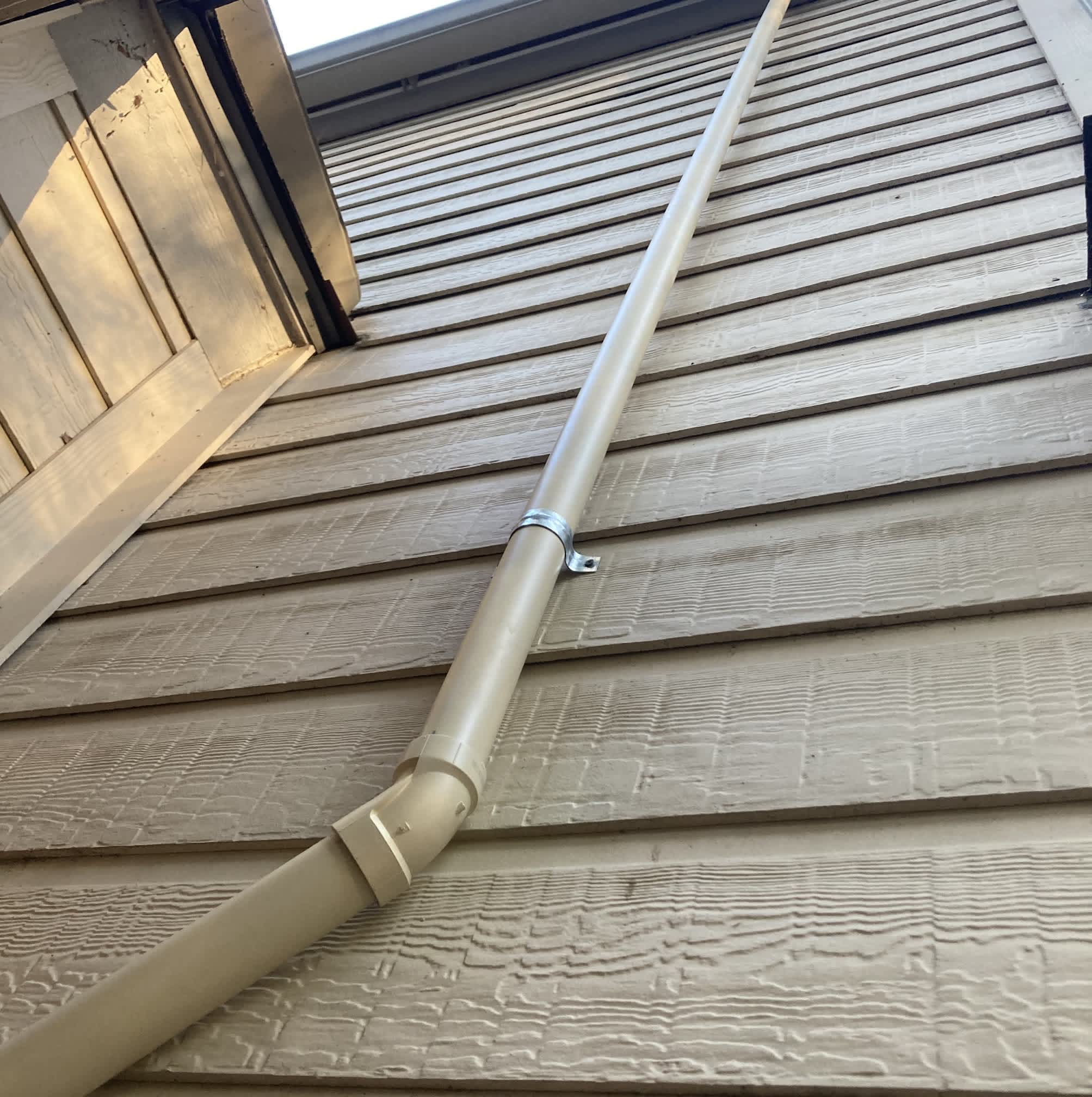 Clean, professionally routed exterior conduit showcases the careful workmanship customers expect from Abacus Plumbing, Air Conditioning & Electrical.