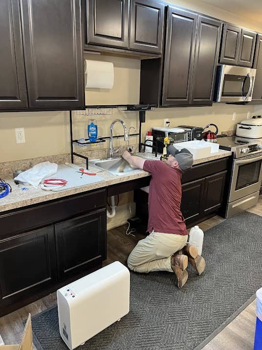 Experience top-notch plumbing solutions with Mrs. Michael Plumbers, Electricians, and HVAC Technicians, where professionalism meets quality service in every kitchen.