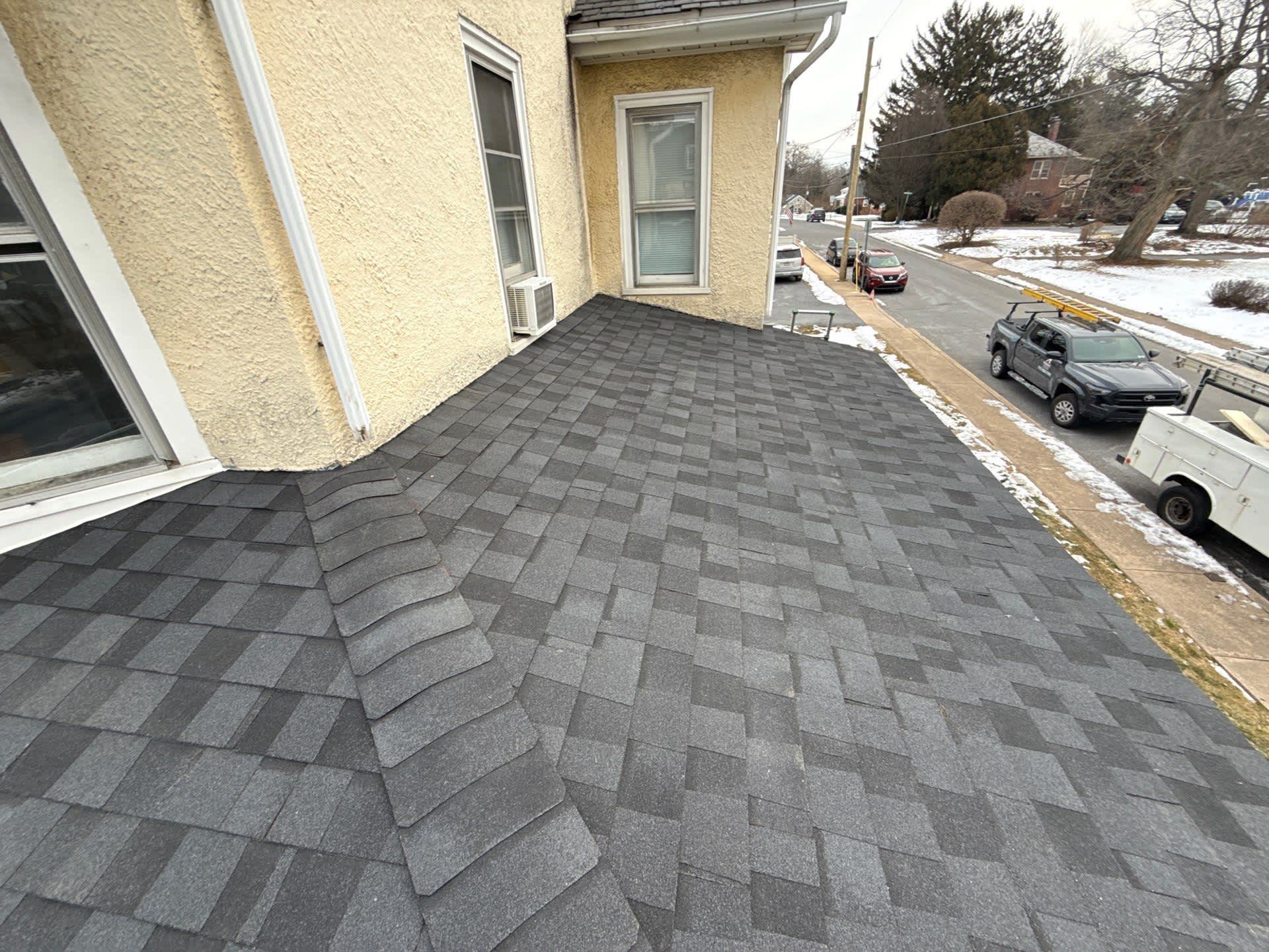 Showcasing meticulous shingle installation and reliable craftsmanship by Mosaic Roofing & Exteriors for long-lasting roof protection.