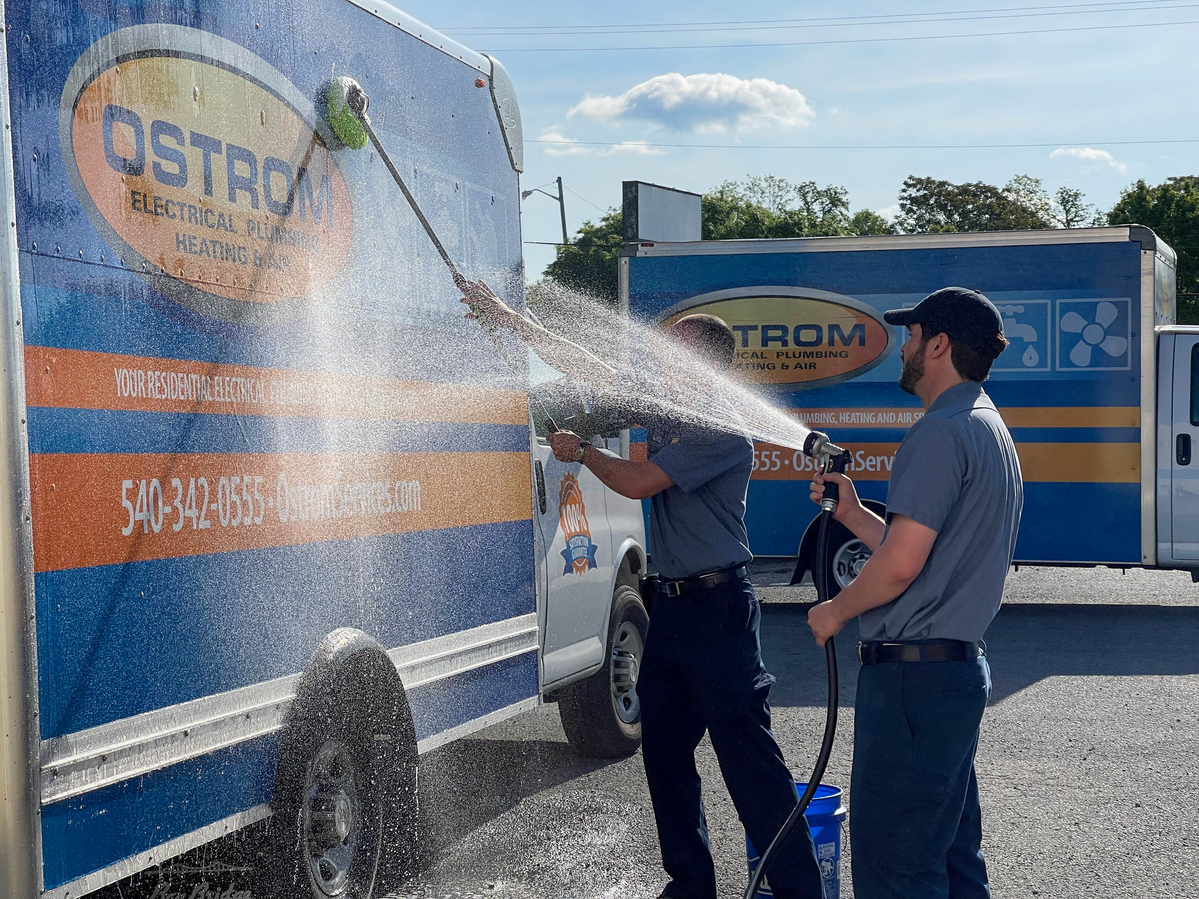Ostrom Electrical Plumbing Heating & Air Conditioning: Professional team ensuring top-notch service and maintenance excellence under every sky.