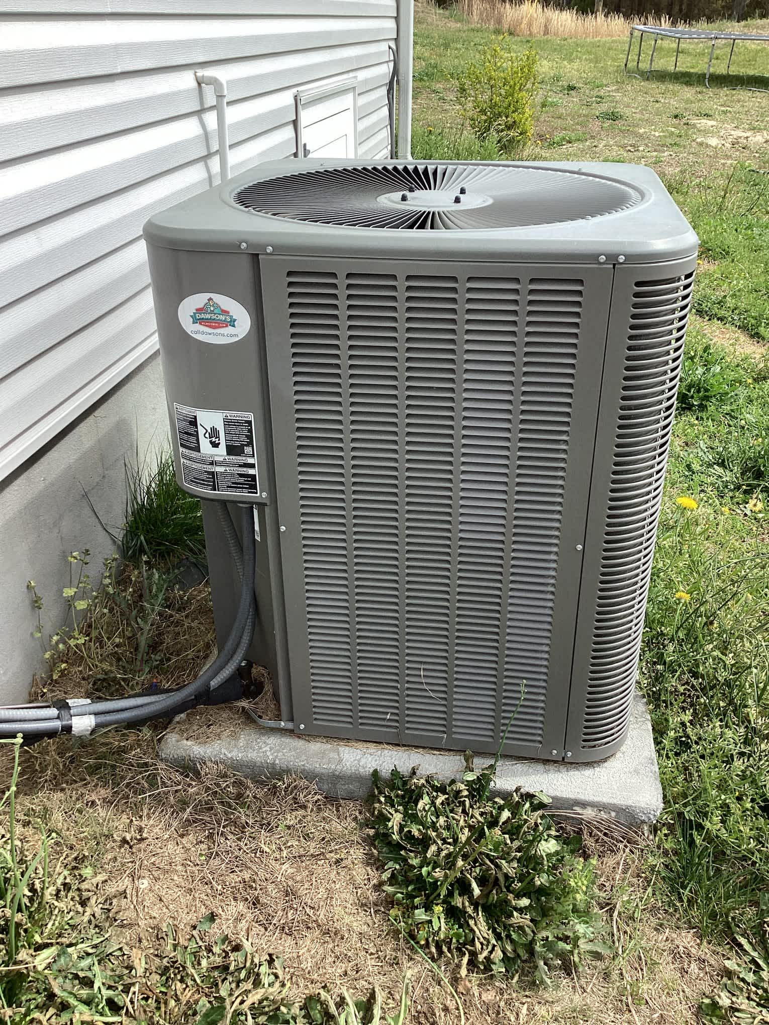 Keep cool and comfortable with Dawson's Electric & Air's reliable AC installations.