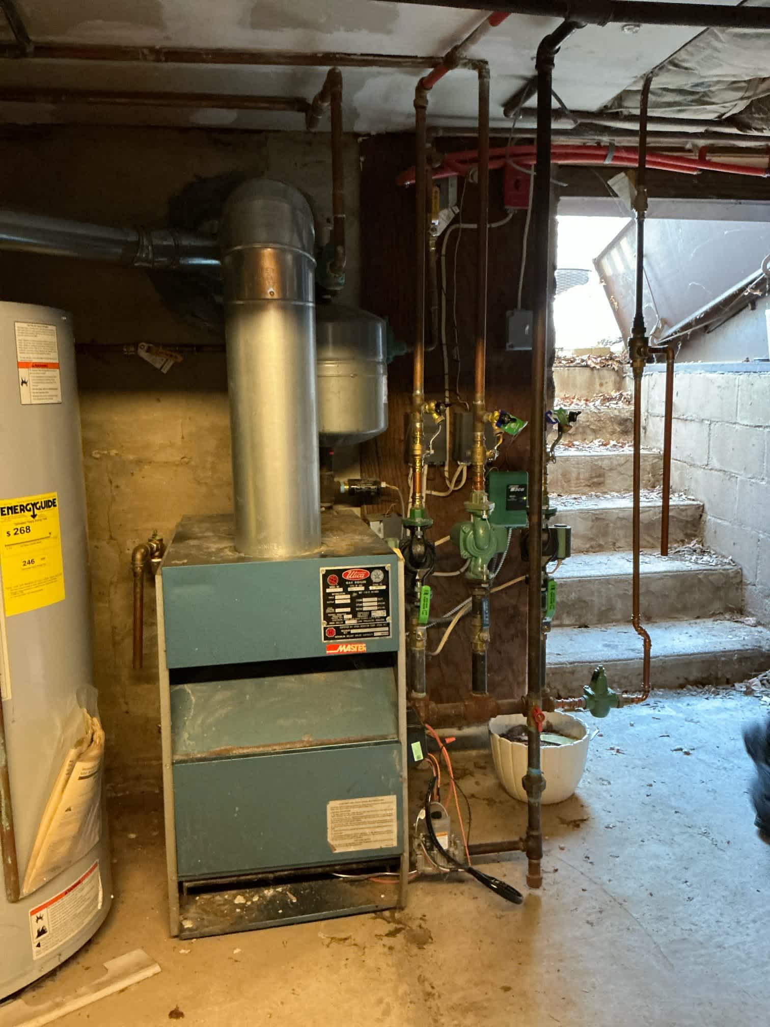 In this image, Gold Star Plumbing, Heating, & Cooling showcases their expertise in maintaining efficient heating systems, ensuring comfort and reliability in every season.
