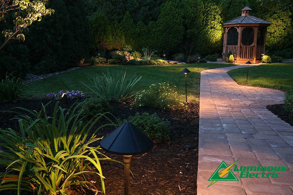 Transform your outdoor space into an enchanting retreat with Luminous Electric's expert lighting solutions, crafting the perfect ambiance for any occasion.