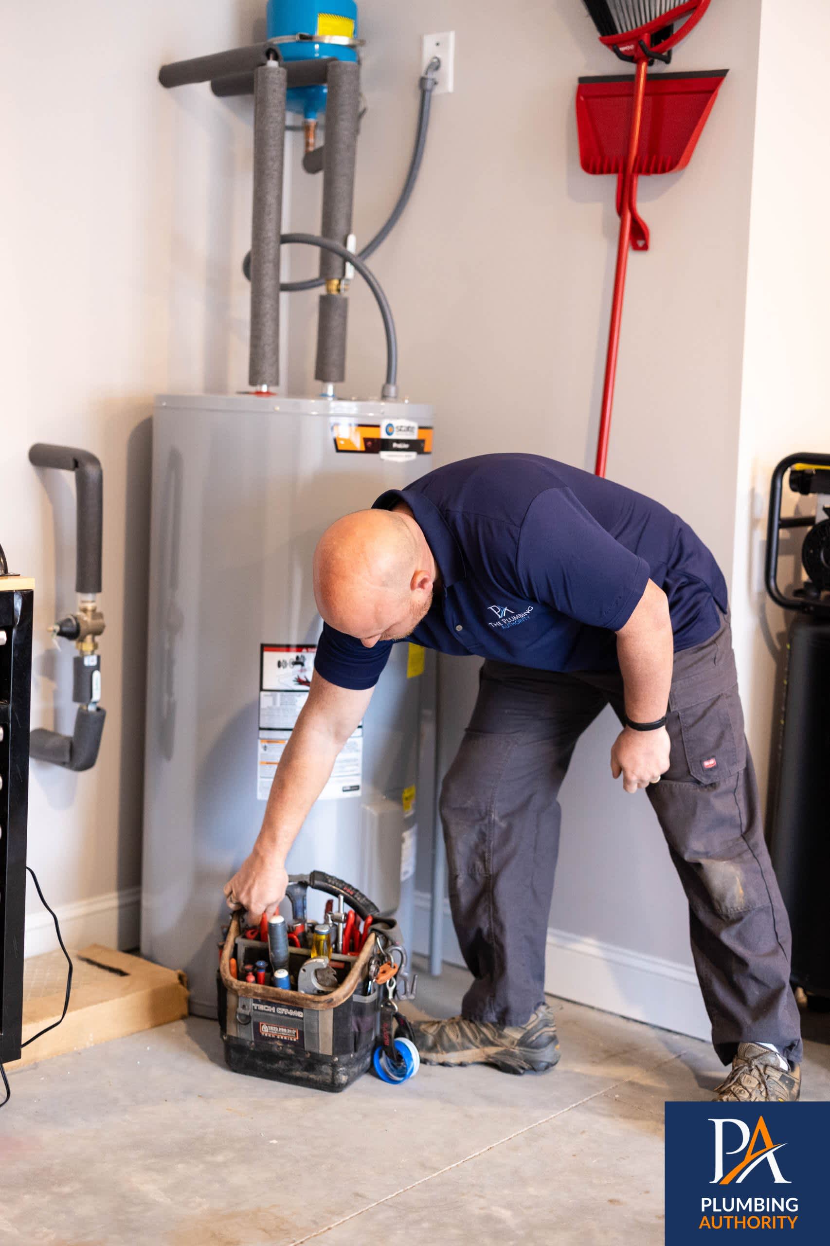 Skilled technicians from The Plumbing Authority arrive prepared and respectful, delivering reliable water heater service with professional care.