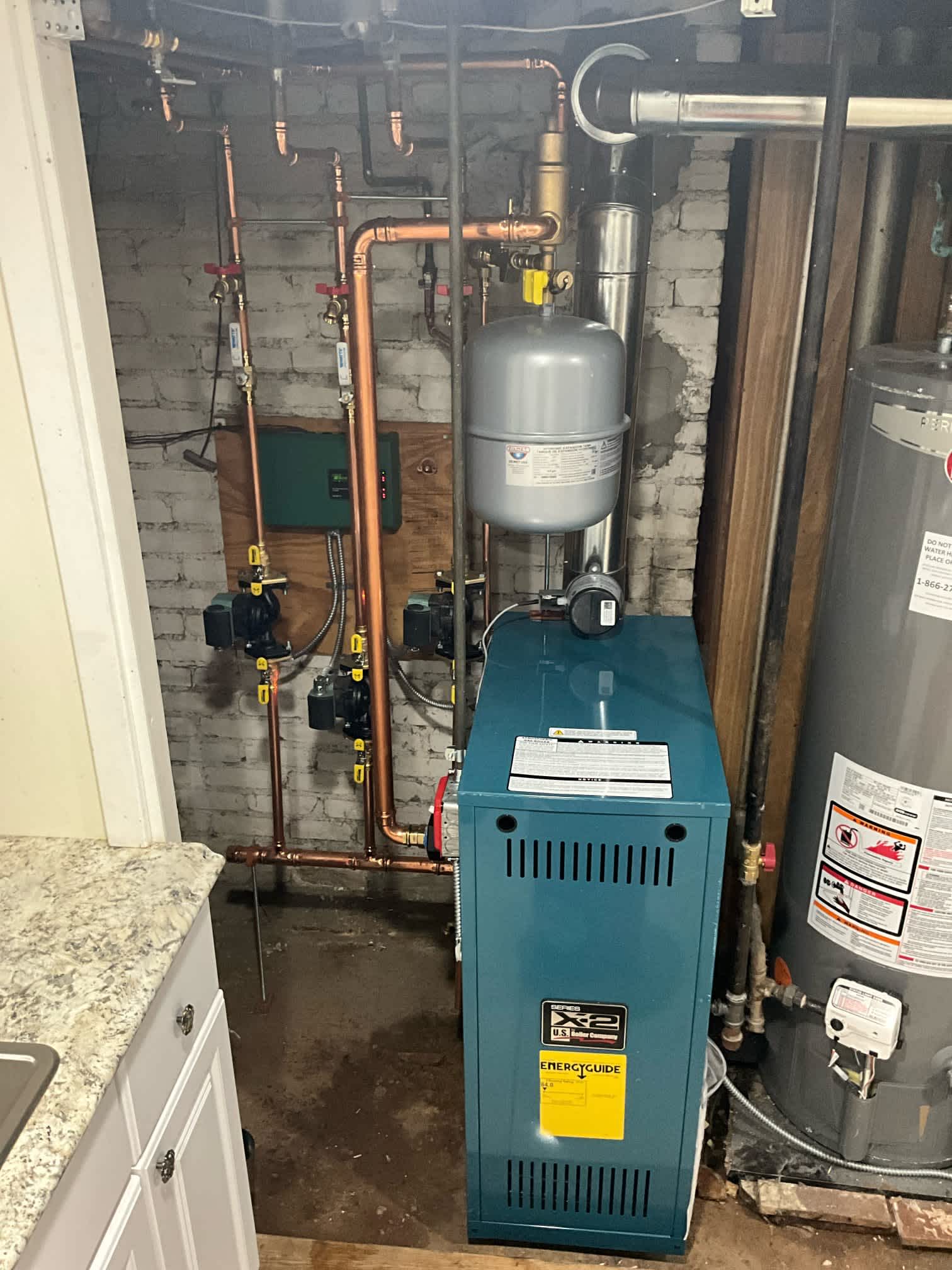 Akian Plumbing, Heating, Cooling & Electric ensures your home stays warm and energy-efficient with expert heating system installations.