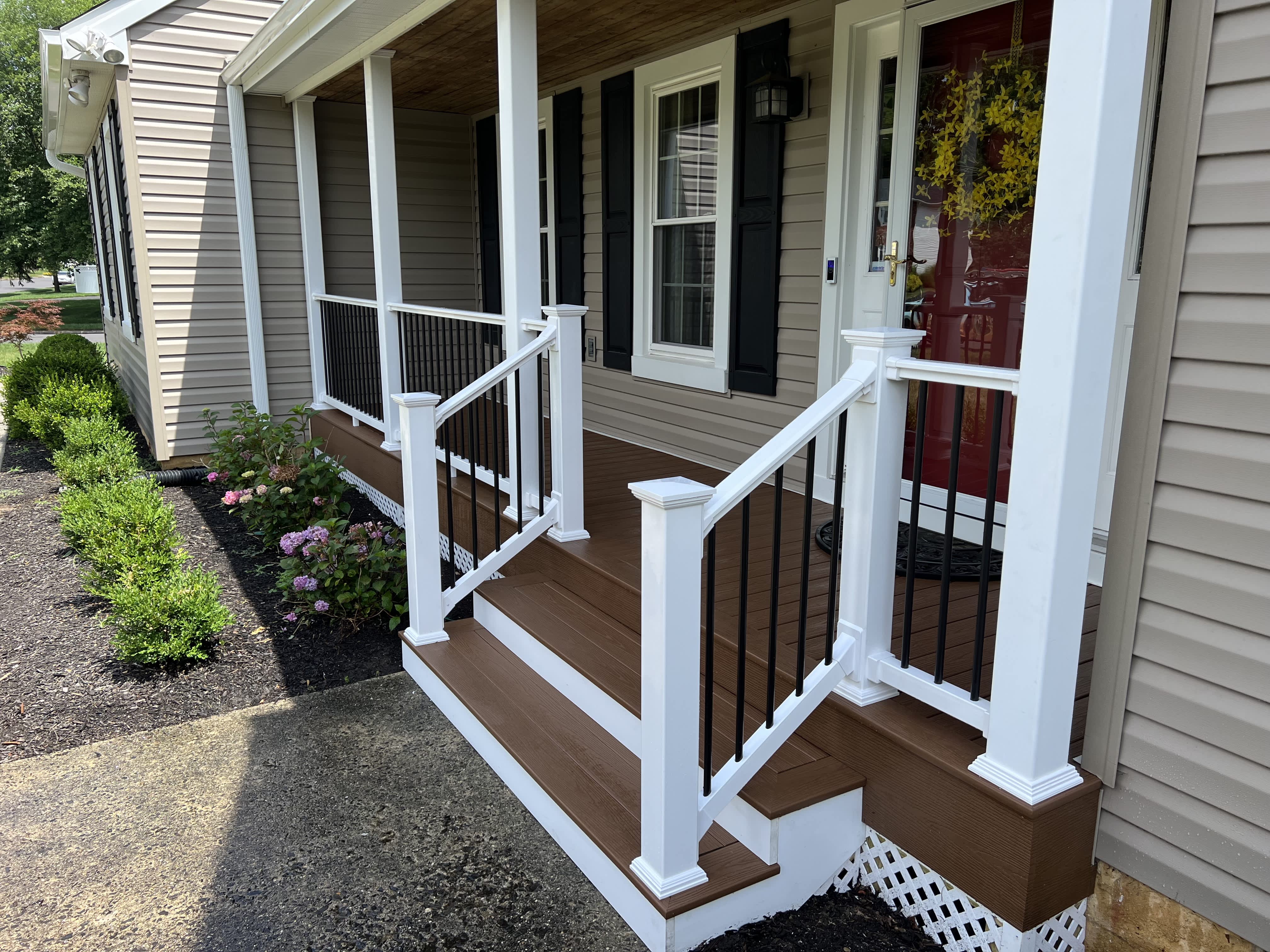 Enhance your home's curb appeal with impeccable porch installations by A. Brooks Construction, Inc. Kanga Roof.