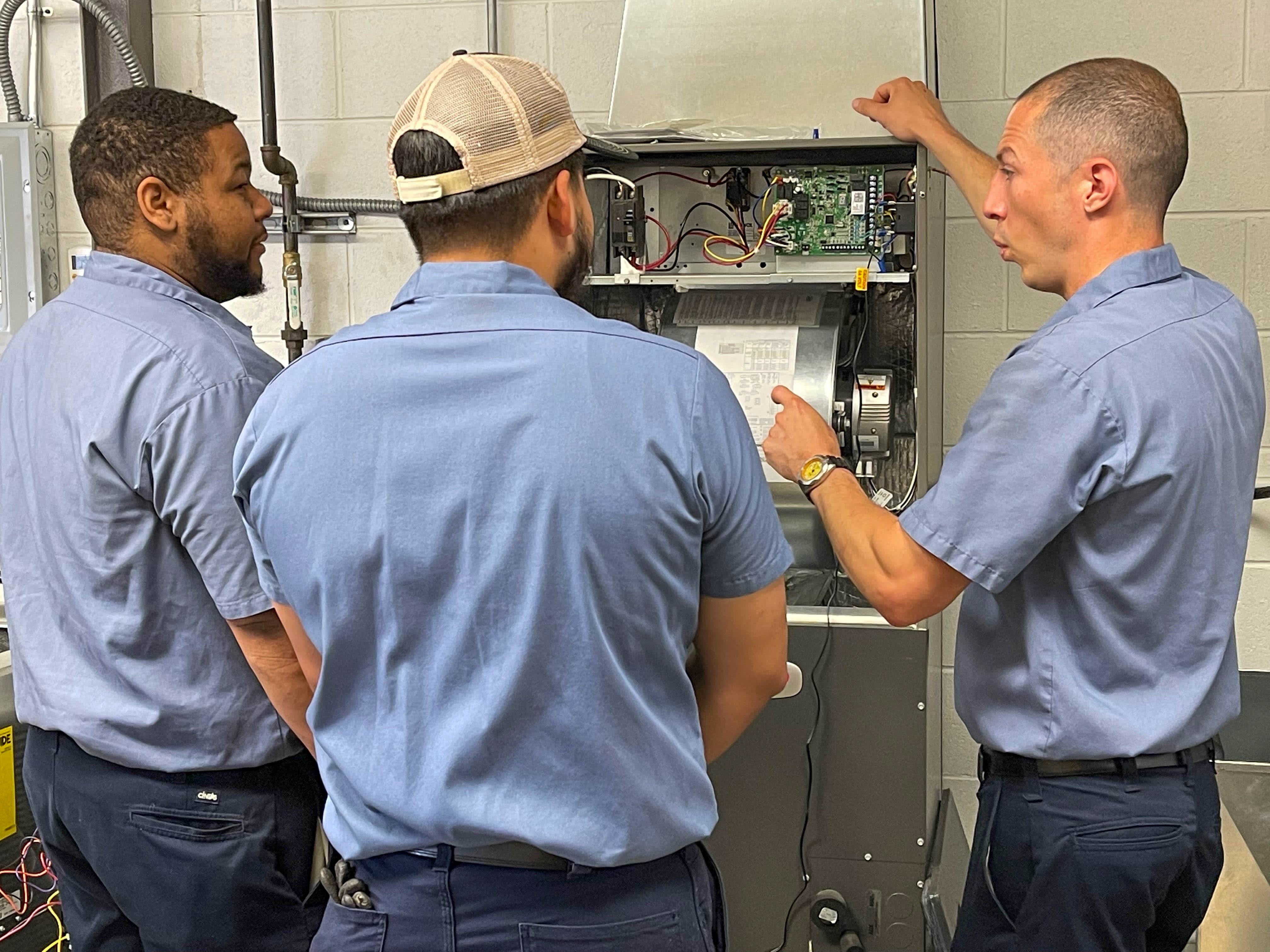 Expert technicians from Ostrom Electrical Plumbing Heating & Air Conditioning ensure your HVAC systems are in perfect working order with precision and care.