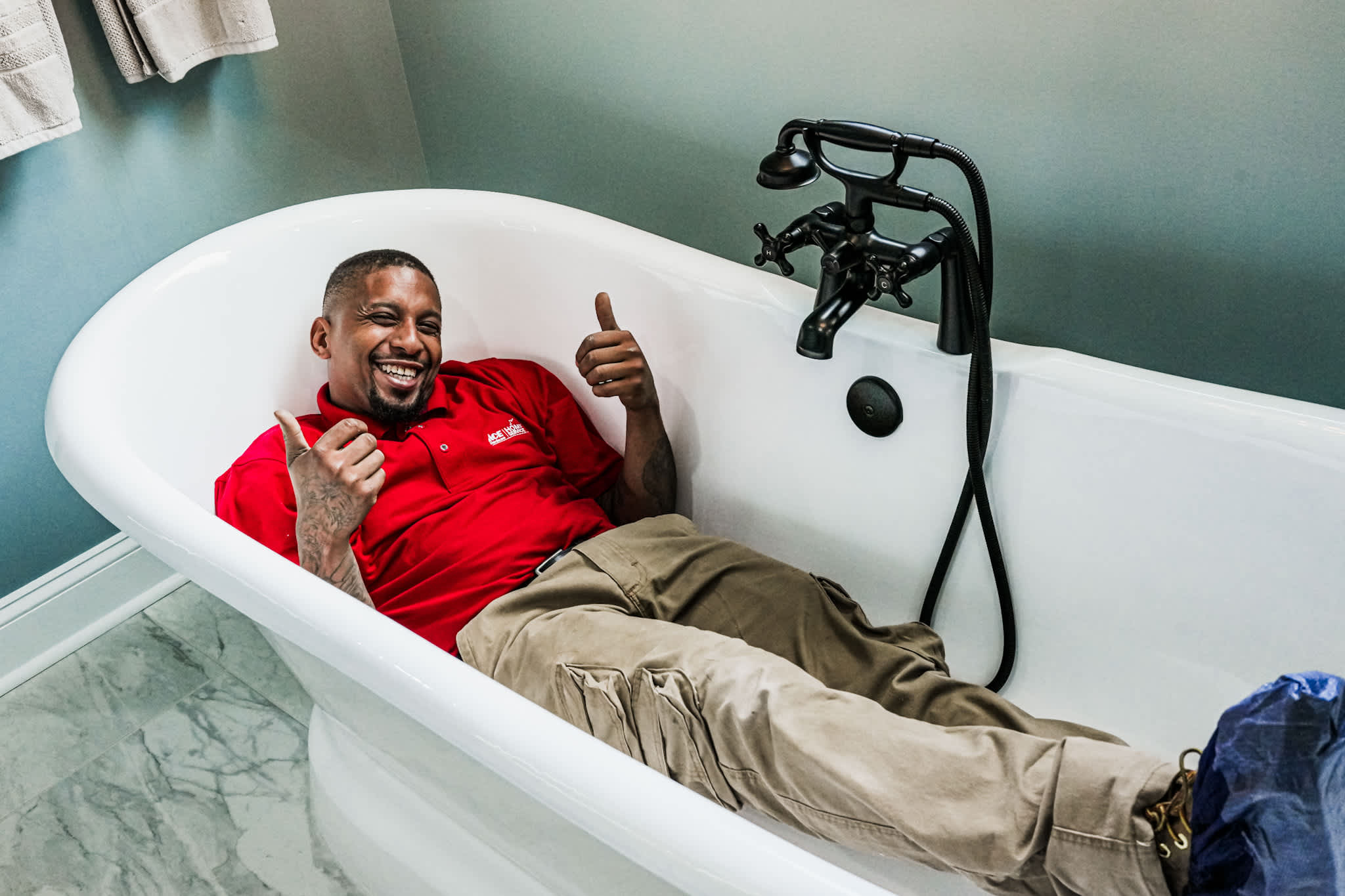Relaxed confidence meets skilled service as Parrish Services shows their friendly technicians and careful bathroom workmanship in every job.