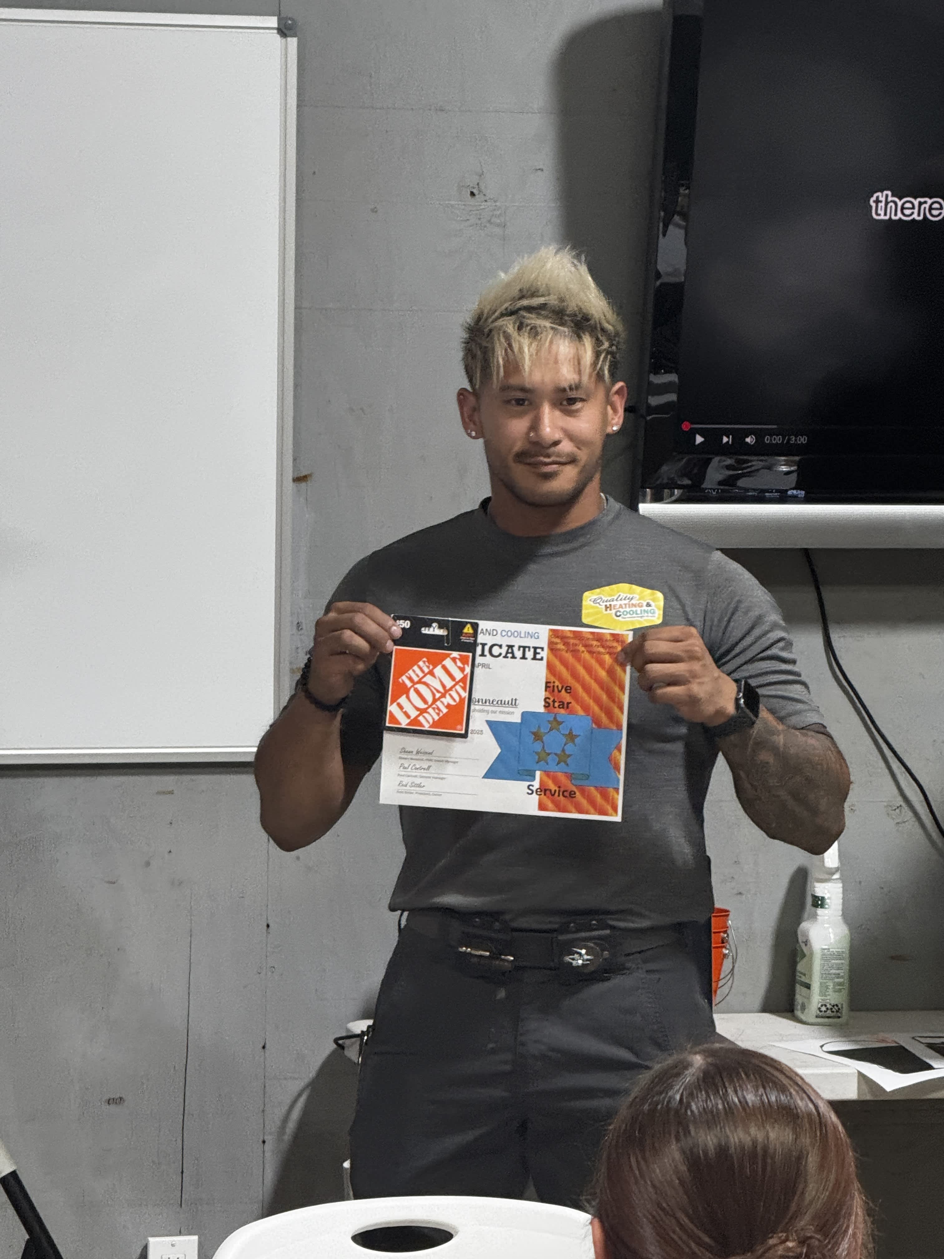 Quality Heating & Cooling celebrates excellence with a five-star service award, showcasing our commitment to professionalism and customer satisfaction.