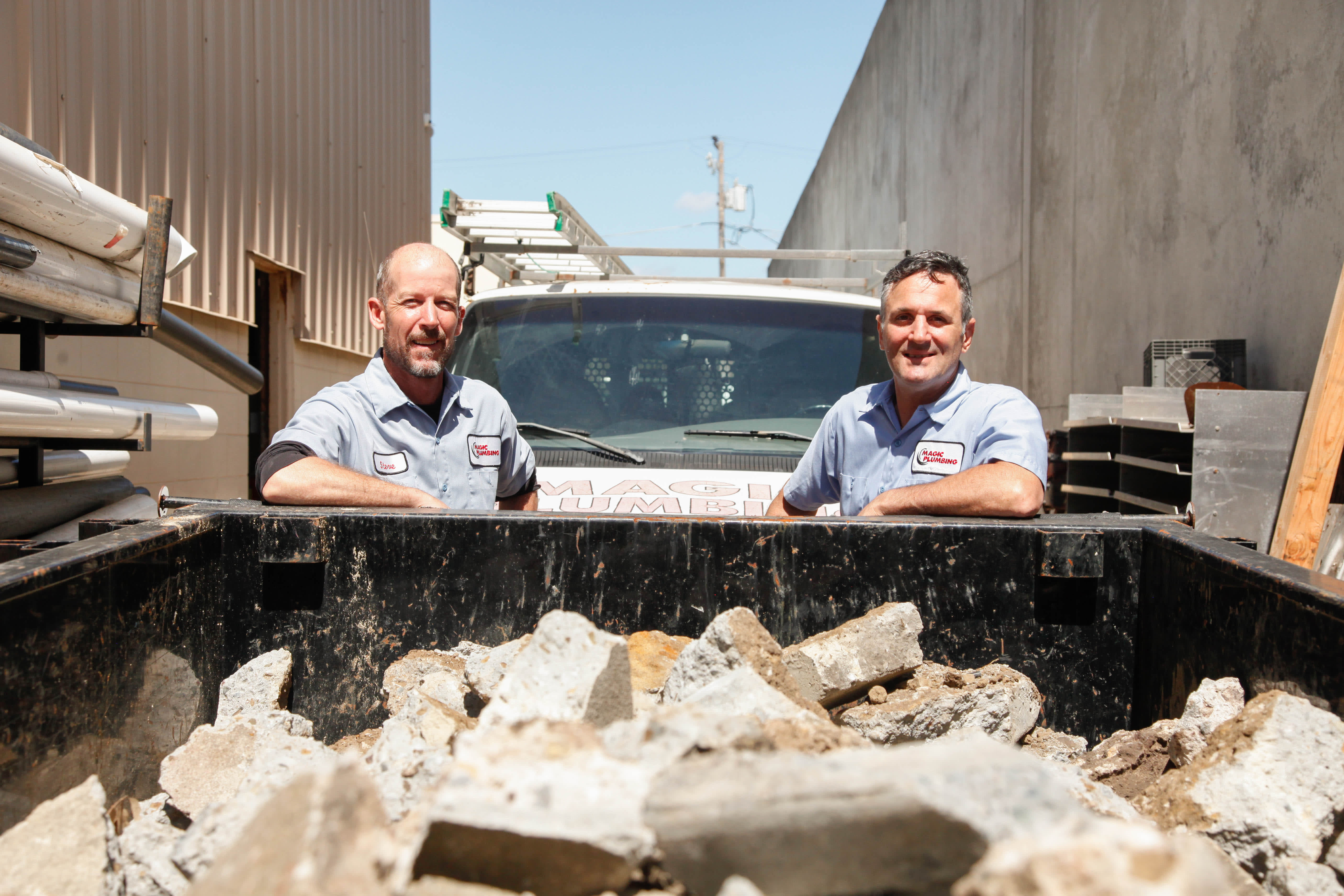 Confident and reliable on-site service, Magic Plumbing Heating & Cooling shows skilled technicians ready to handle tough plumbing jobs.