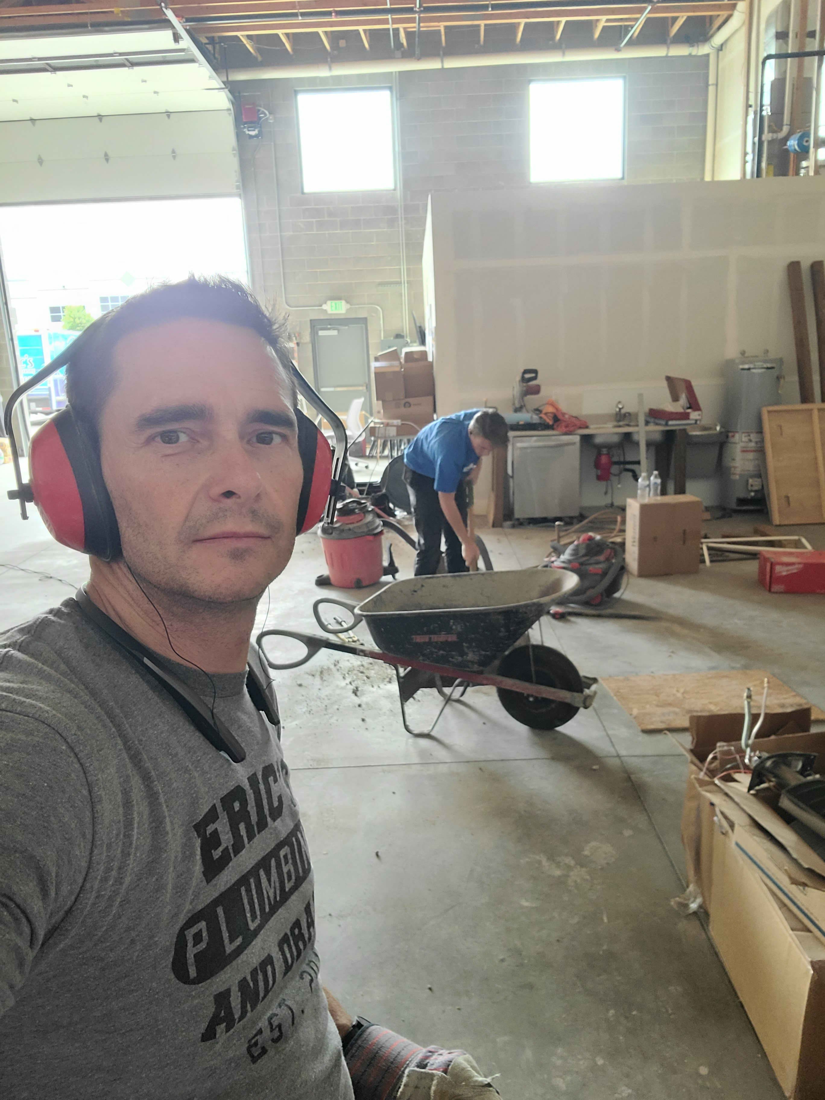Eric's Plumbing & Drain Cleaning showcases professionalism and a variety of services in a well-equipped workspace.