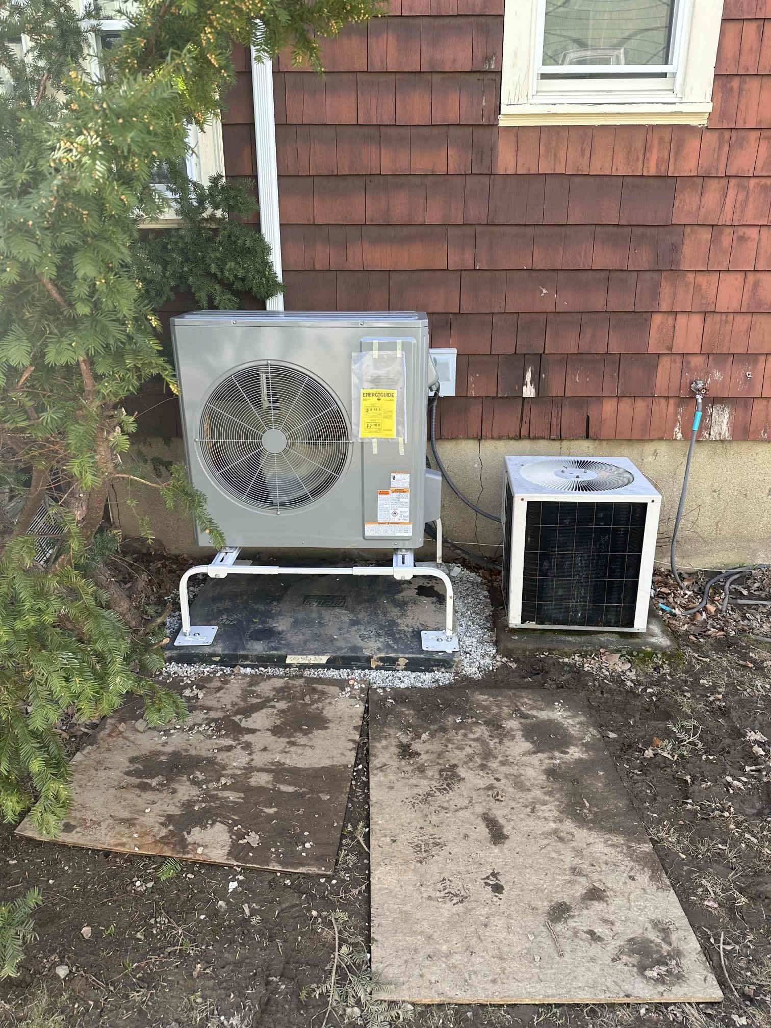 Clean, professional installation highlights Akian Plumbing, Heating, Cooling & Electric’s attention to durable HVAC upgrades and careful site protection.
