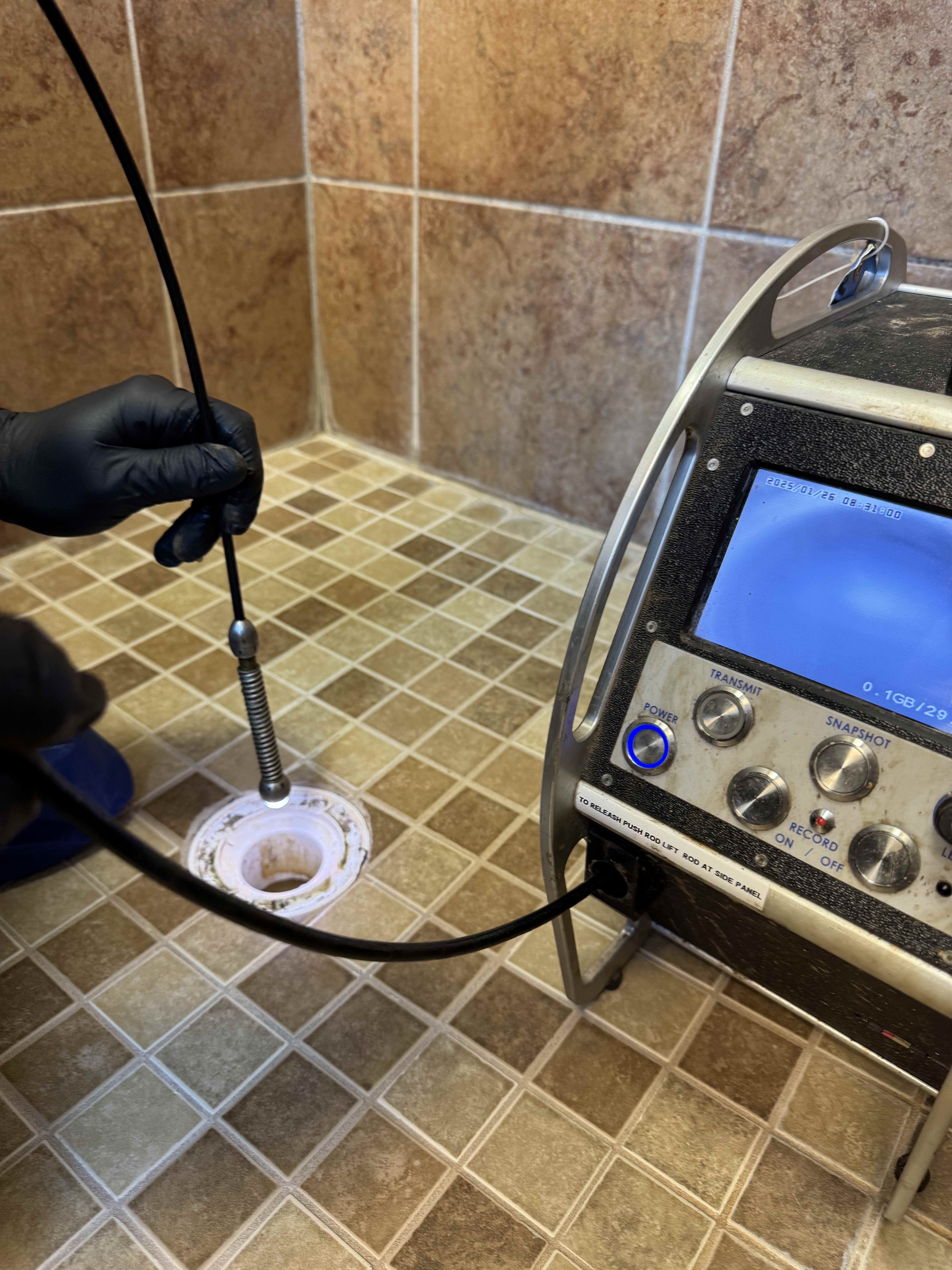 Aquarius Home Services: Using state-of-the-art equipment for precise plumbing inspections, ensuring quality and professionalism.