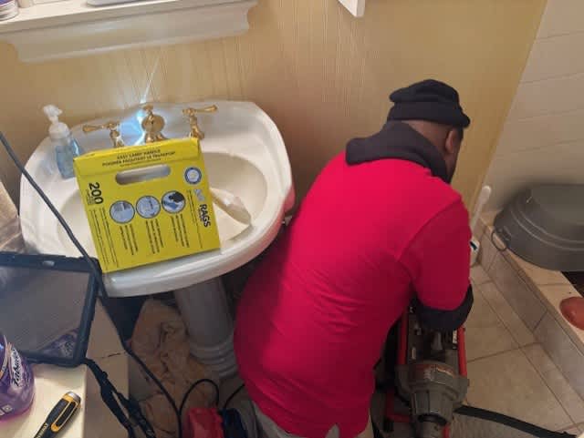 A Parrish Services technician resolves stubborn bathroom clogs quickly and neatly, protecting your home while restoring reliable drainage.