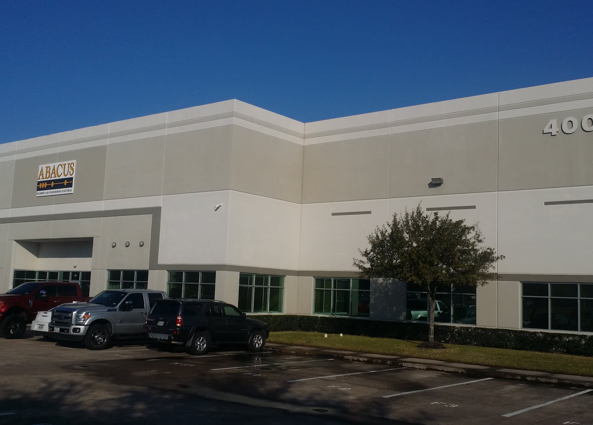 A clean, professional facility and visible fleet showcase Abacus Plumbing, Air Conditioning & Electrical reliability and readiness to serve customers.