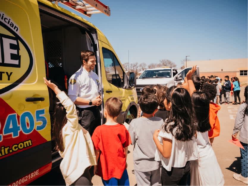 Milestone Electric, A/C & Plumbing showcases its commitment to community and professionalism, engaging with the next generation while ensuring reliable service.