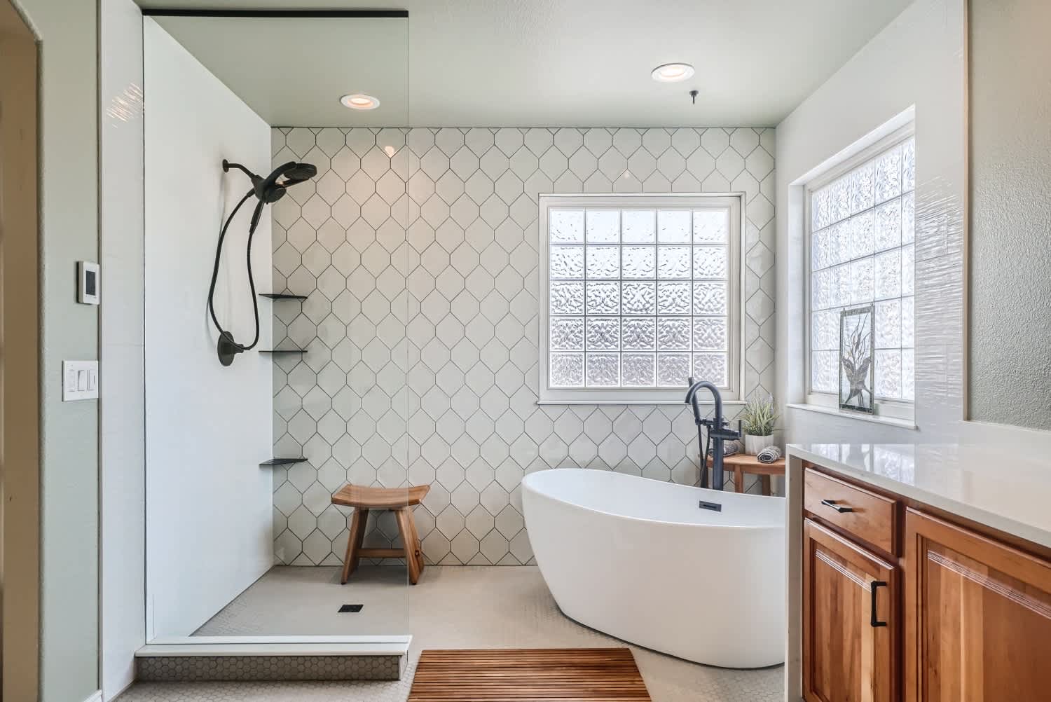 Transform your bathroom into a luxurious retreat with Bell Plumbing, Heating, Cooling & Electrical's expert services.