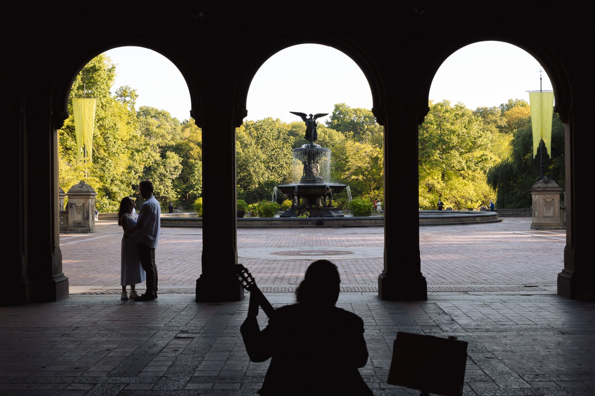 Matt and Louise silhouetted under the Bethesda Terrace arches