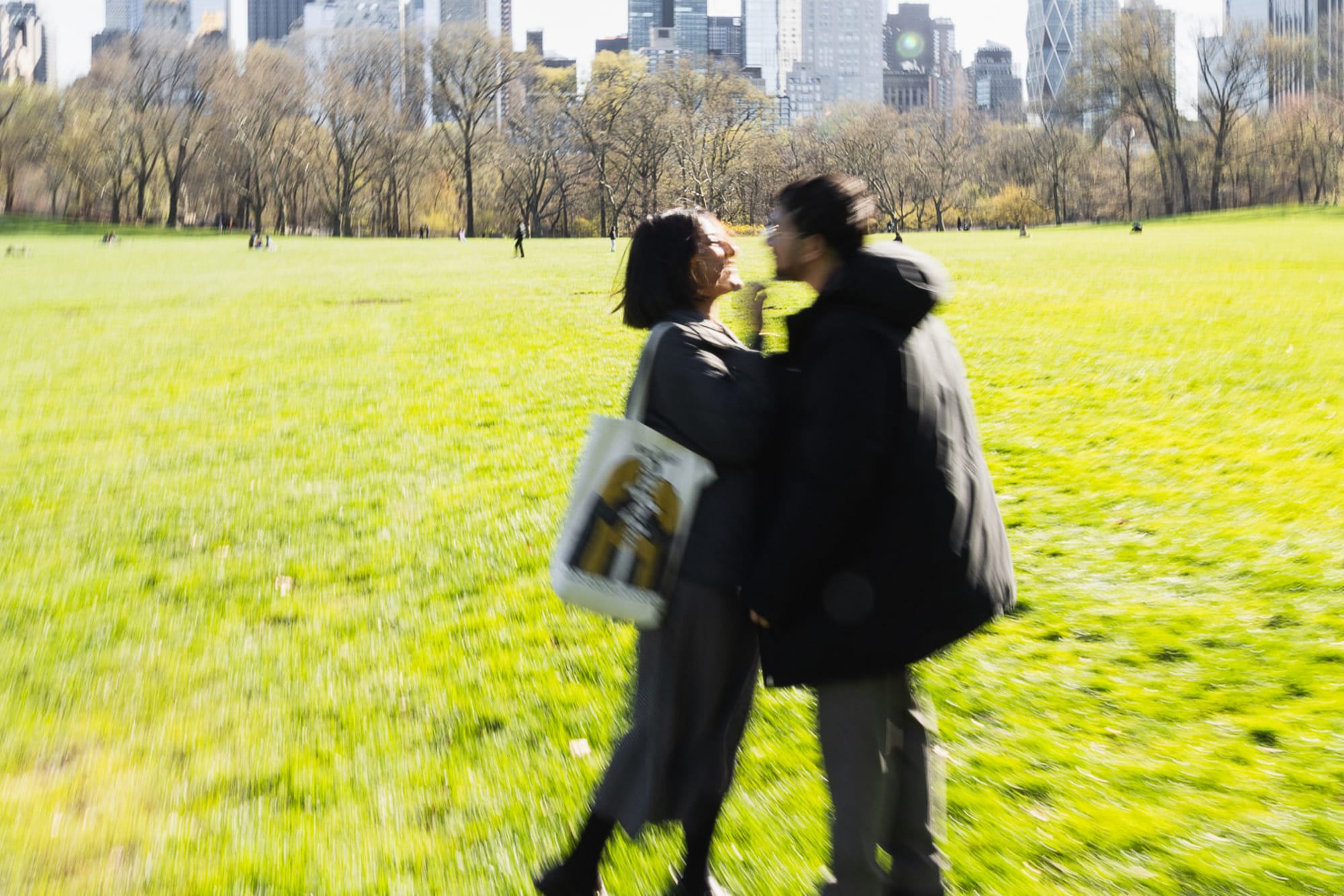 Spring couples photo session in Central Park with cherry blossoms