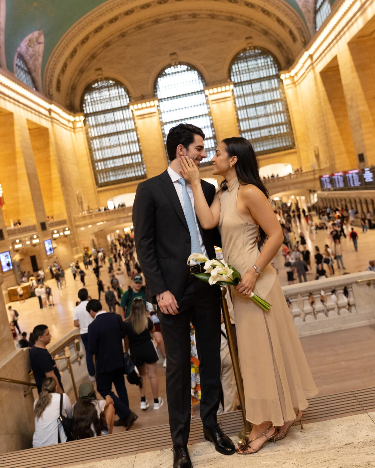 Alvaro and Maria kissing in the main concourse of Grand Central Terminal