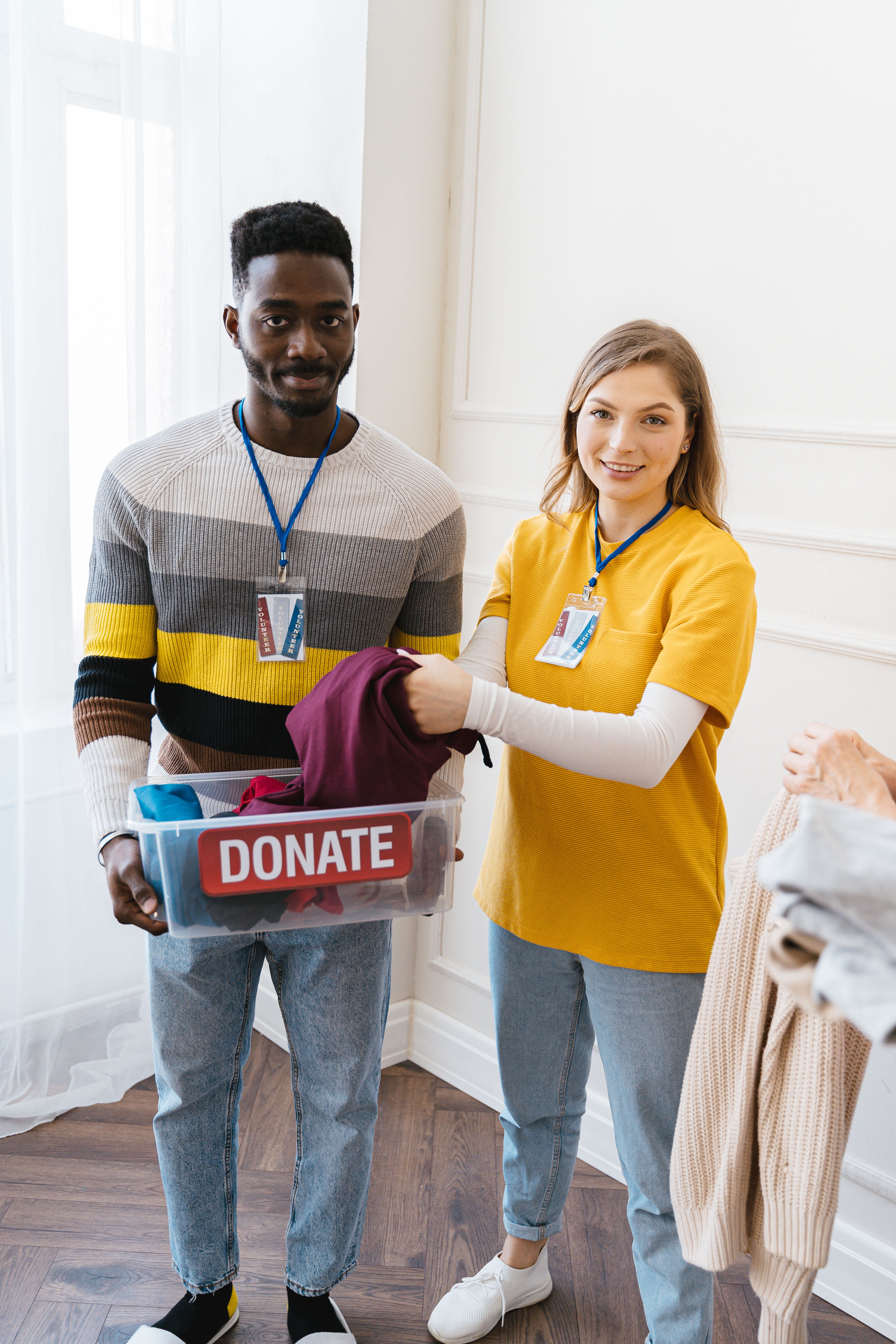 Muslim men and women participating in a community service project and getting to know one another through shared charitable work.