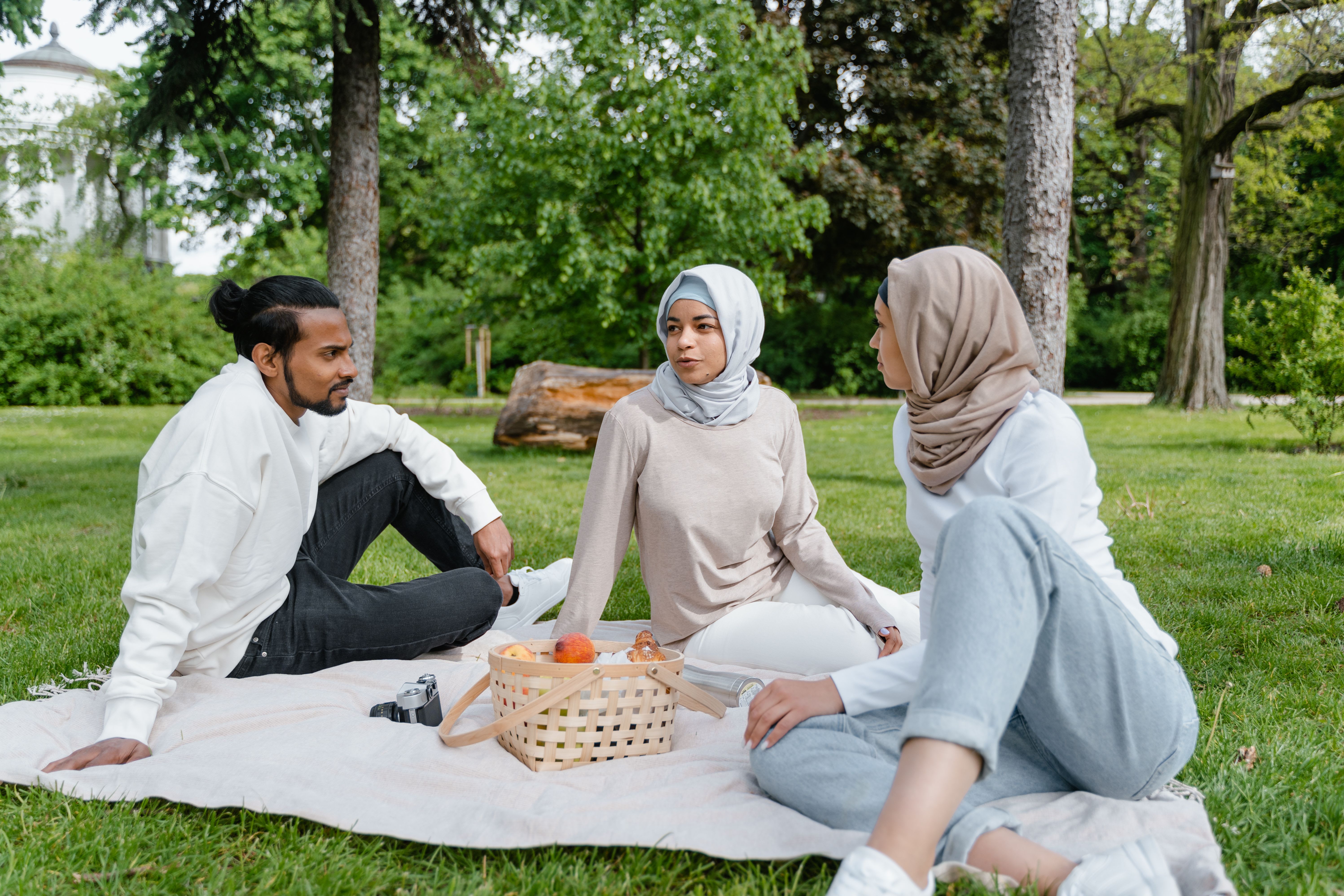 Muslim adult discussing marriage preferences with family members while balancing personal choice, Islamic values, and family expectations.