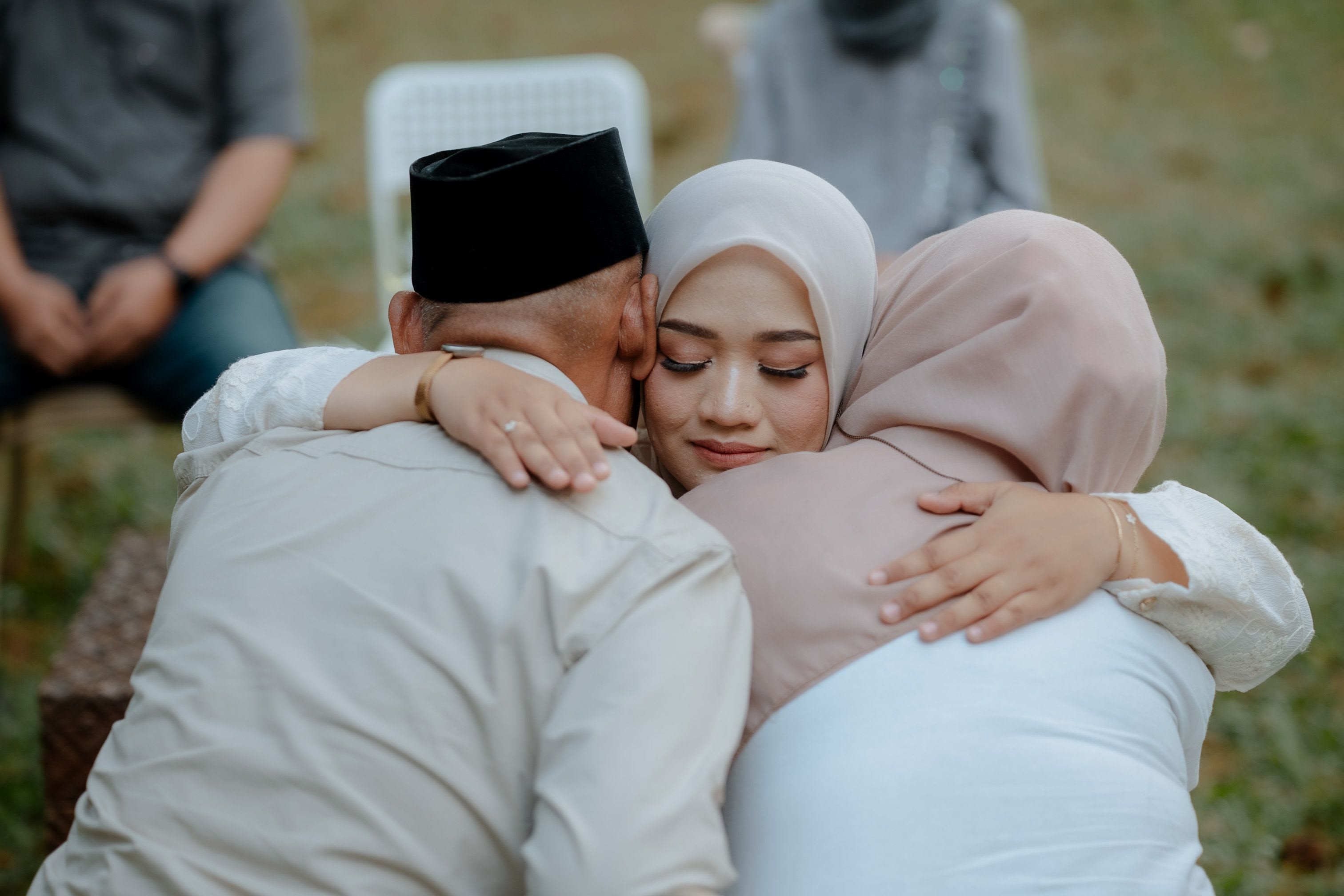 Muslim family and Islamic marriage representative discussing the roles of a wali and wakil before a nikah ceremony.